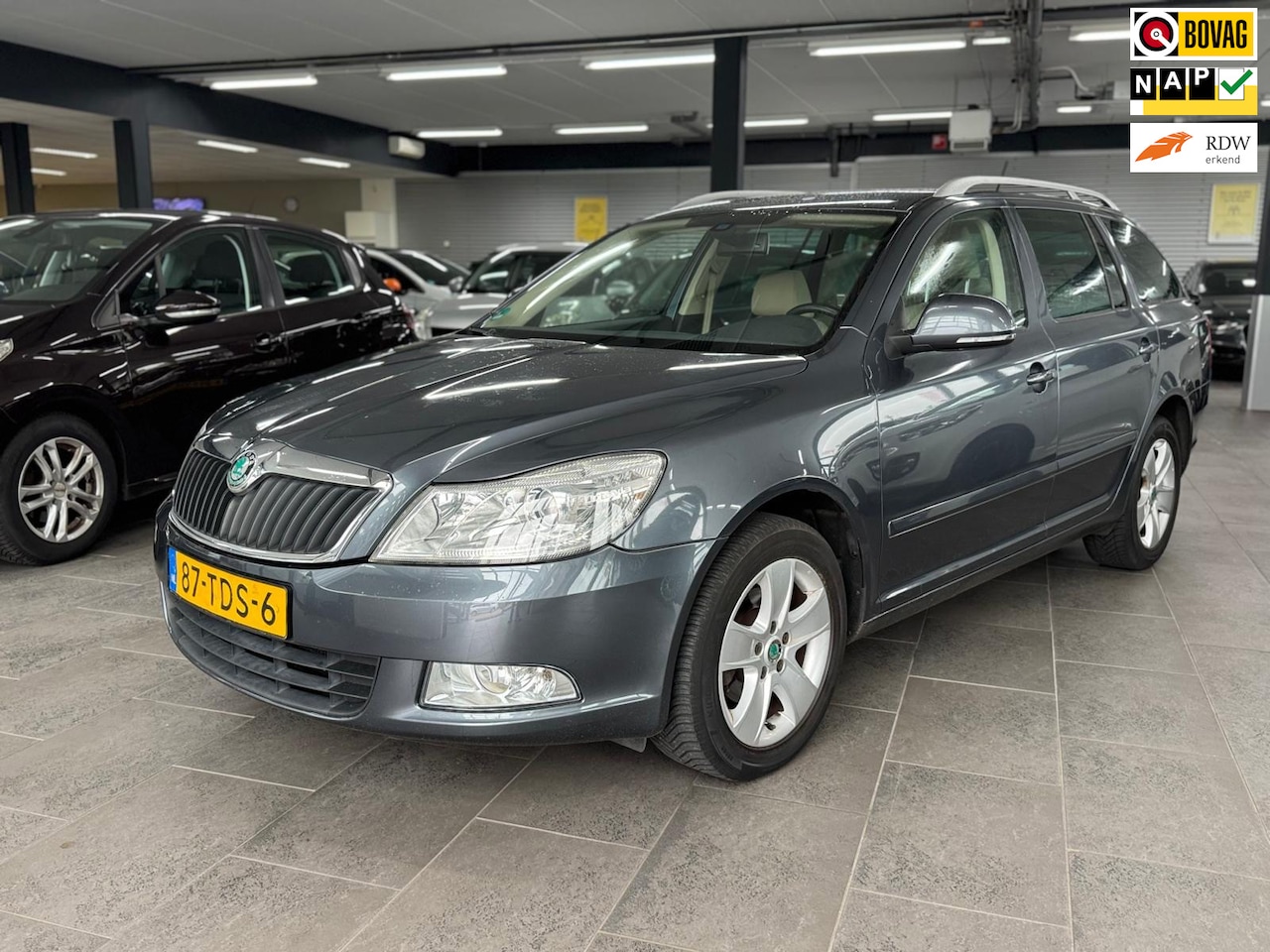 Skoda Octavia Combi - 1.4 TSI Greentech Elegance Navi clima cruise control lm-velgen elek-pakket pdc stoelverwar - AutoWereld.nl