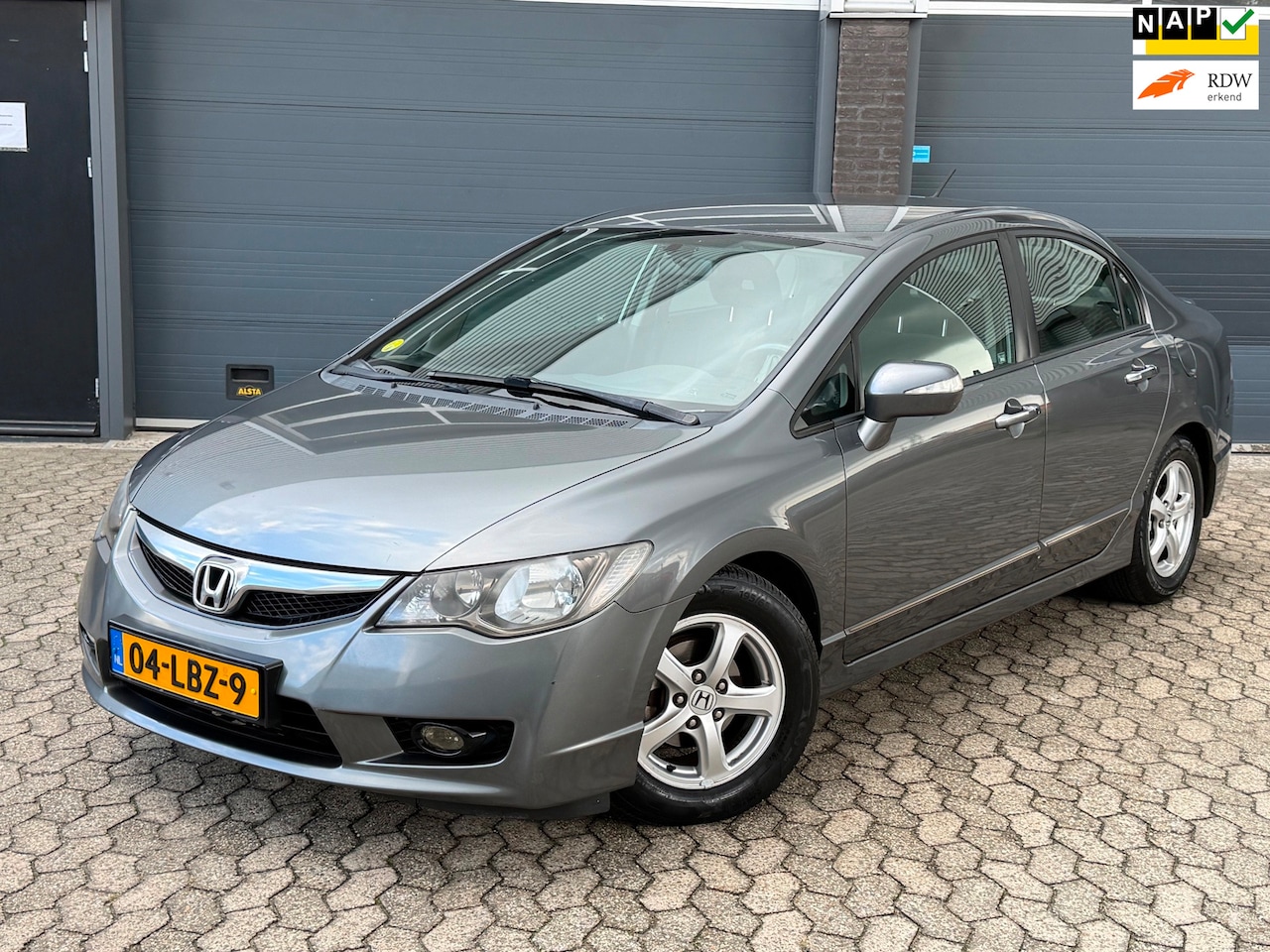 Honda Civic - 1.3 Hybrid Elegance|CLIMA|CRUISE|NAVI|APK - AutoWereld.nl