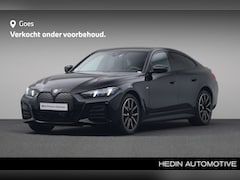 BMW i4 - eDrive40 84 kWh | M Sportpakket Pro | Comfort Access | Extra getint glas in achterportierr