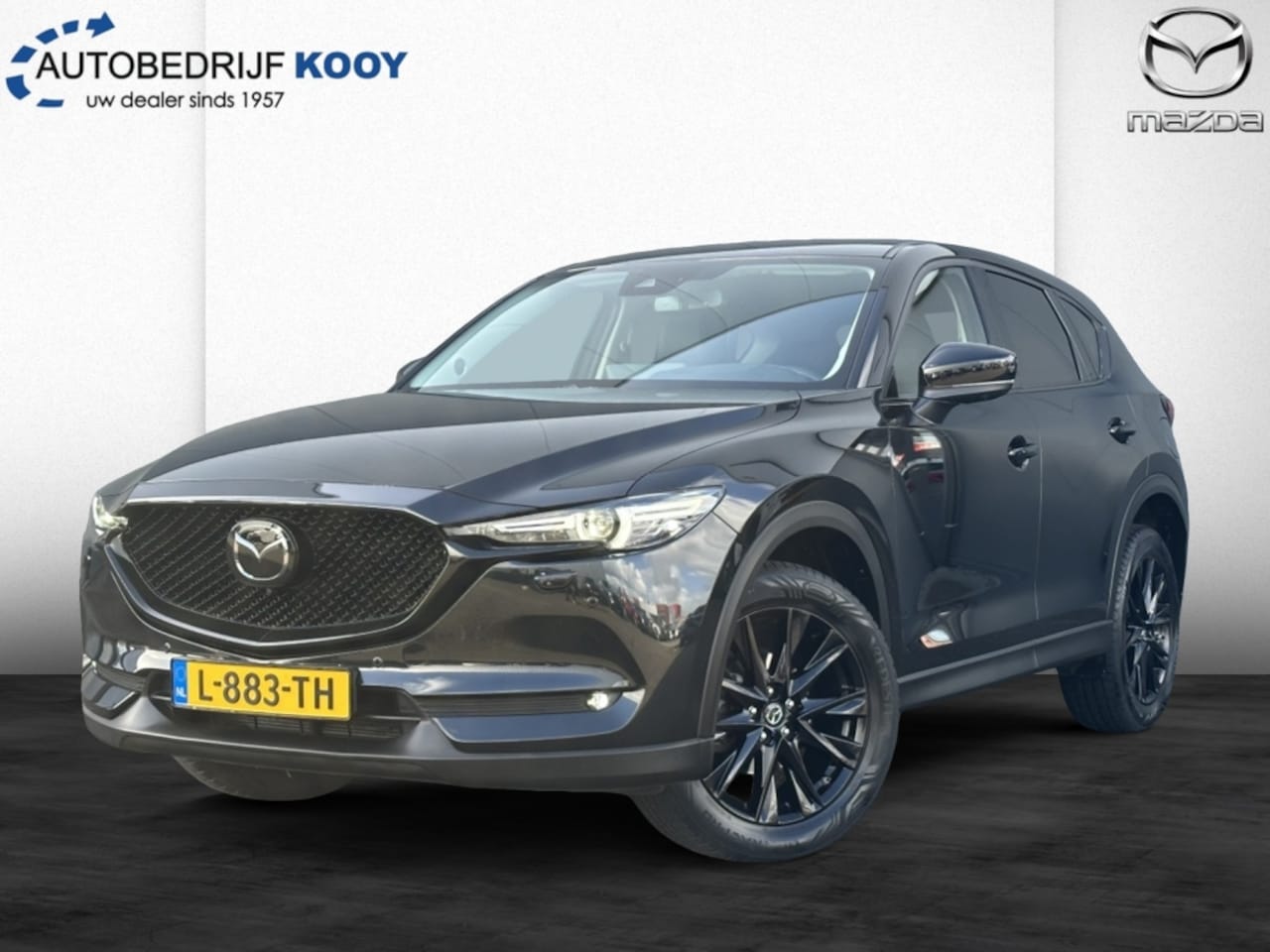 Mazda CX-5 - 2.0 SkyActiv-G 165pk Sportive / Zwarte logo's & sierlijsten / Trekhaak - AutoWereld.nl