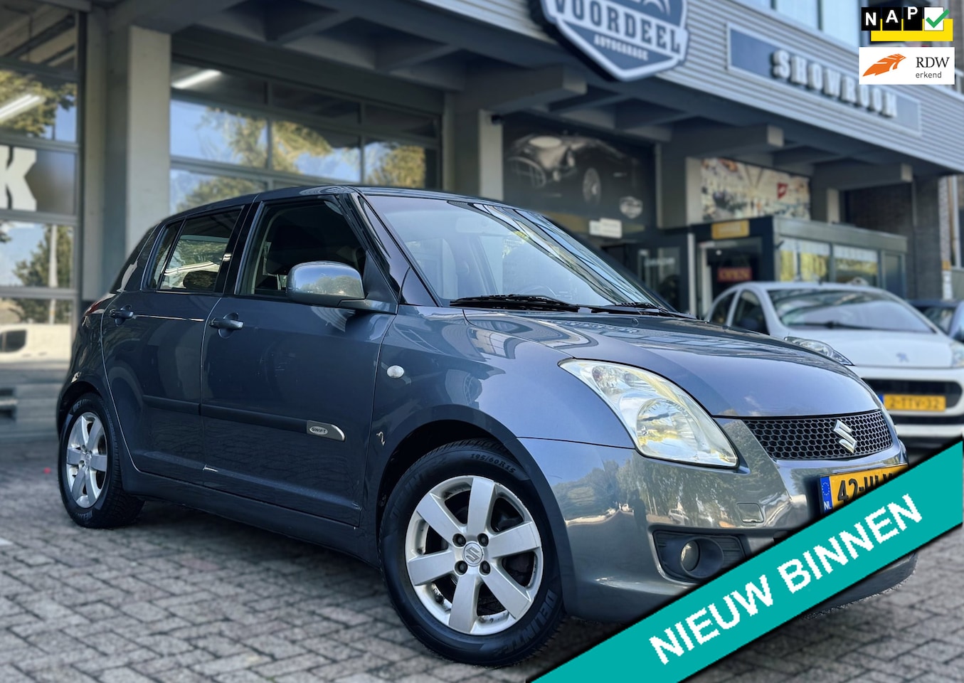 Suzuki Swift - 1.3 Shogun | NAVI | AIRCO | ELEK.RAMEN | NAP | APK. - AutoWereld.nl