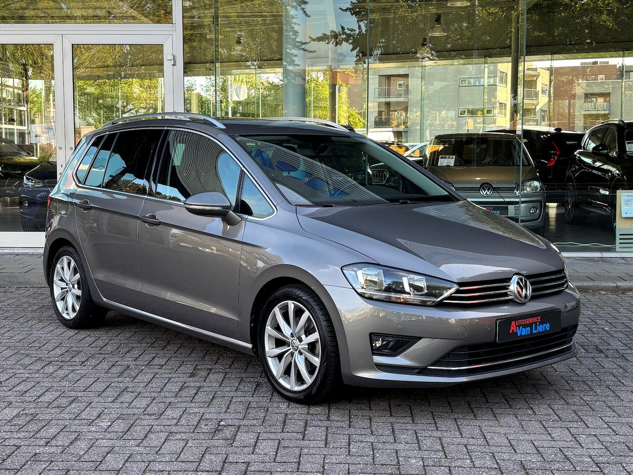 Volkswagen Golf Sportsvan - 1.4 TSI 125pk DSG HighLine| Trekhaak| Navi|Cruise|ECC|Rijklaarprijs incl. garantie - AutoWereld.nl