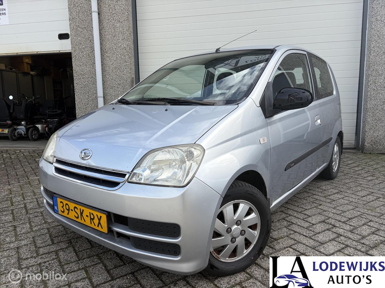 Daihatsu Cuore - 1.0 Sporty/automaat/airco - AutoWereld.nl