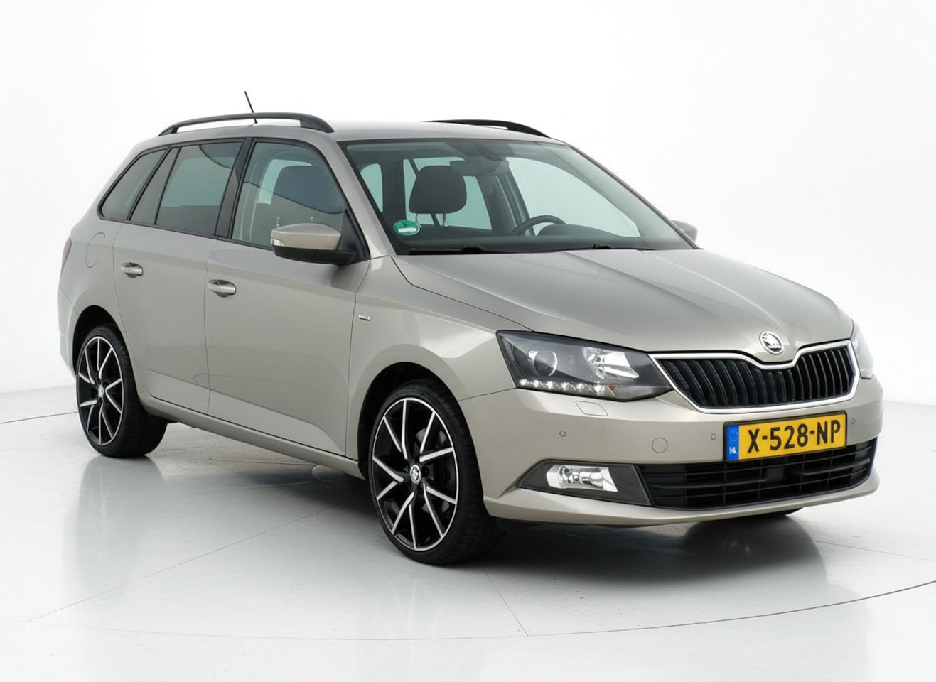 Skoda Fabia Combi - 1.2 TSI Drive|AUT|Cruise|PDC|Clima|Trekh. - AutoWereld.nl