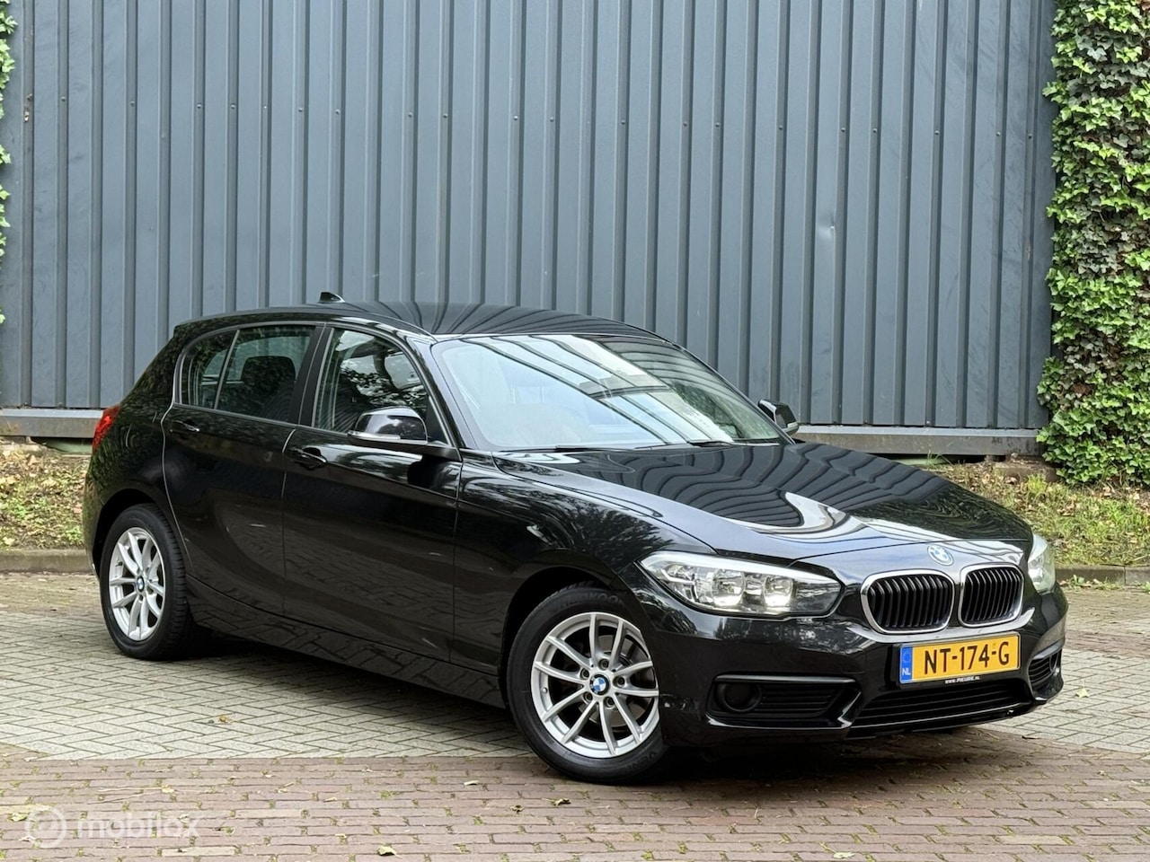 BMW 1-serie - 116d Sport |Automaat|Stoelverw|LED|Pdc|Boekjes - AutoWereld.nl