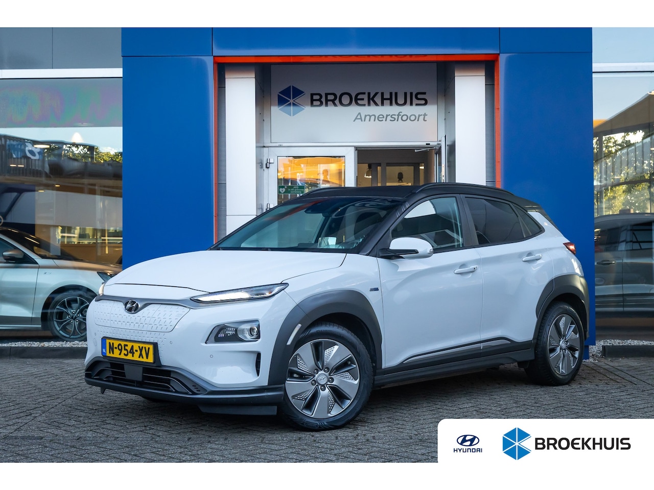 Hyundai Kona Electric - EV Comfort 64 kWh | Head-Up | Apple Carplay/Android Auto | Leder | Adaptive Cruise Control - AutoWereld.nl