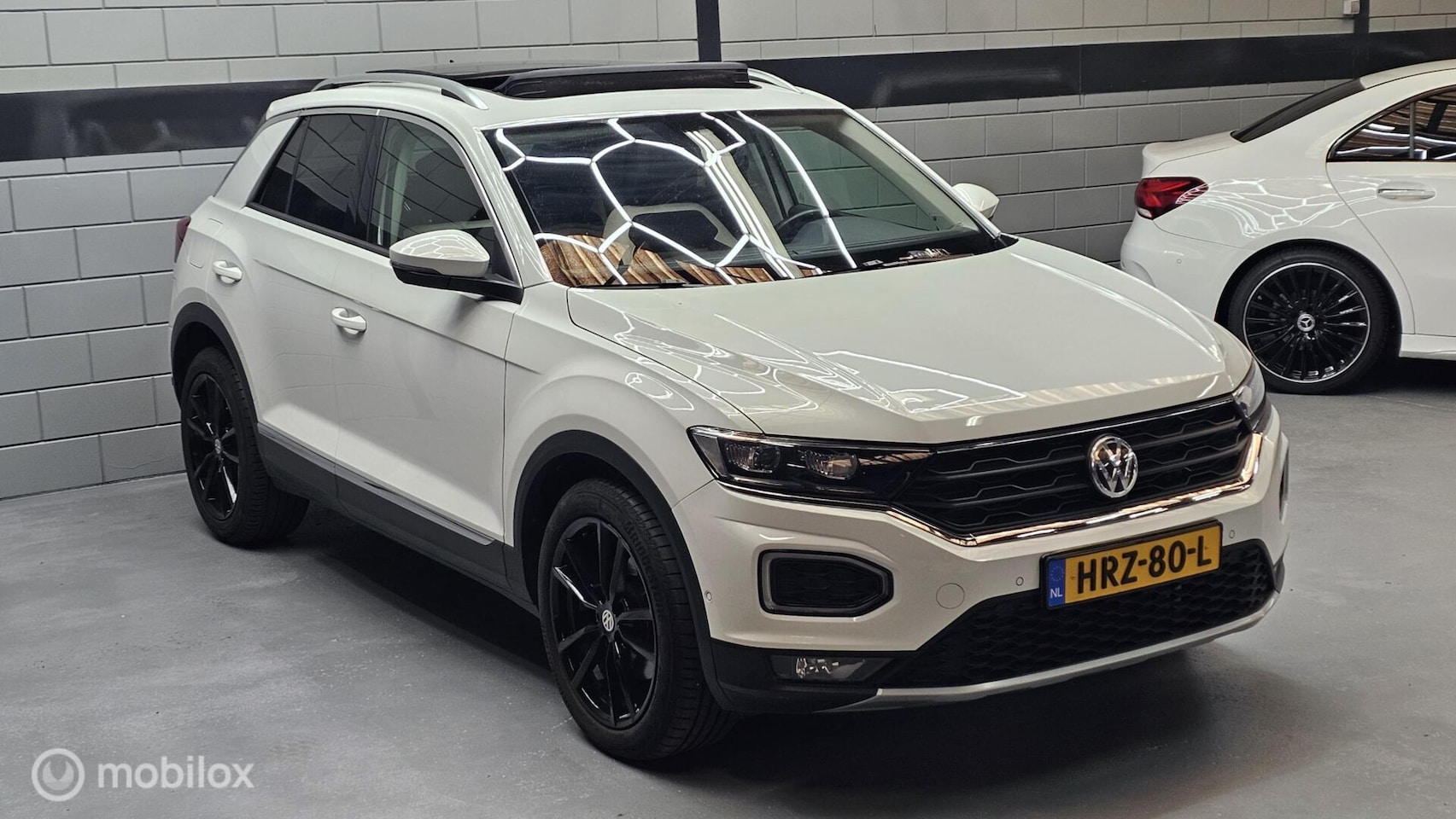 Volkswagen T-Roc - 1.5 TSI Sport Pano Camera LMV - AutoWereld.nl