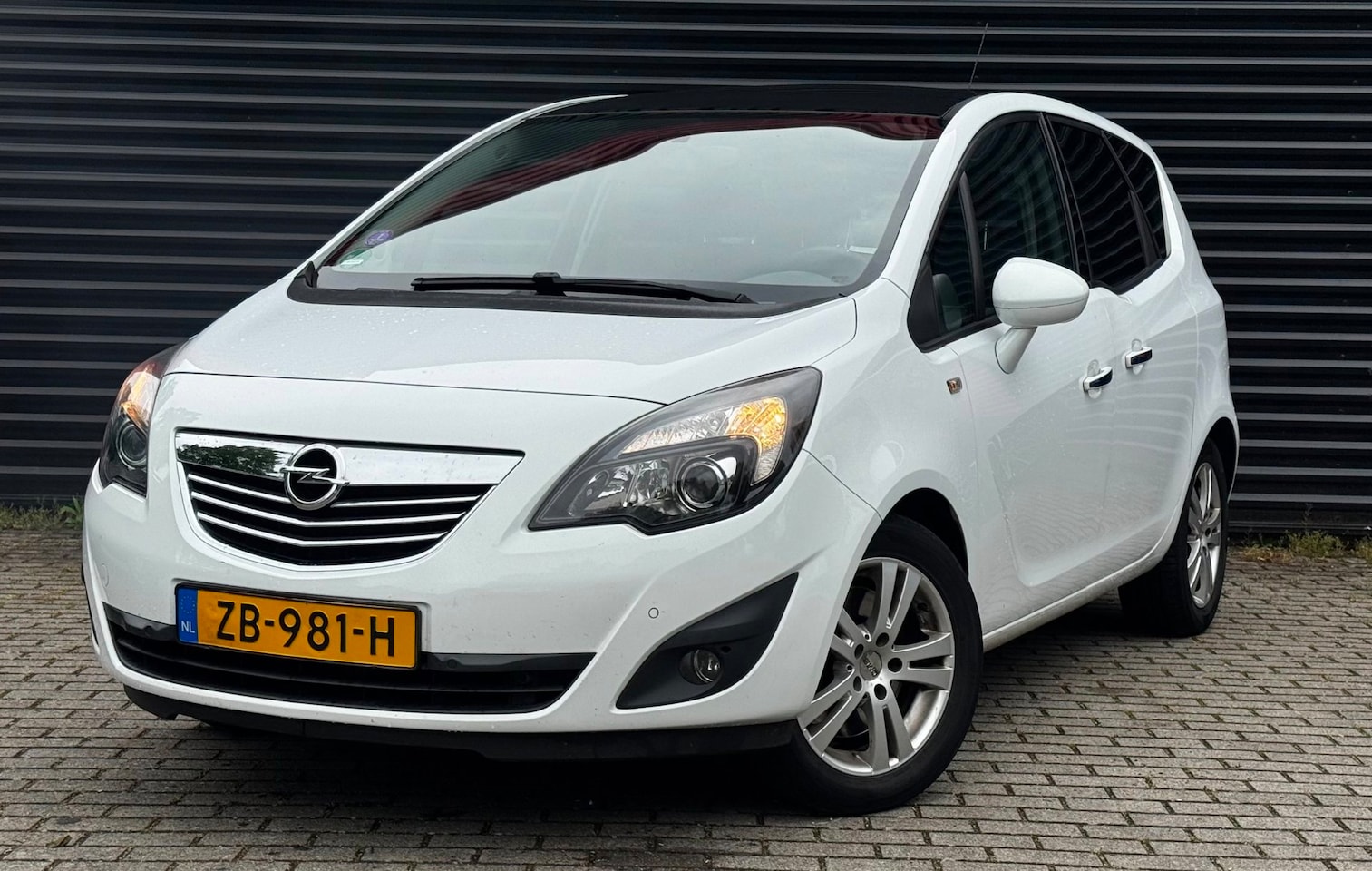 Opel Meriva - 1.4 Turbo Cosmo | Panoramadak | Trekhaak | Stoelverwarming | Cruise | Halfleder | PDC - AutoWereld.nl