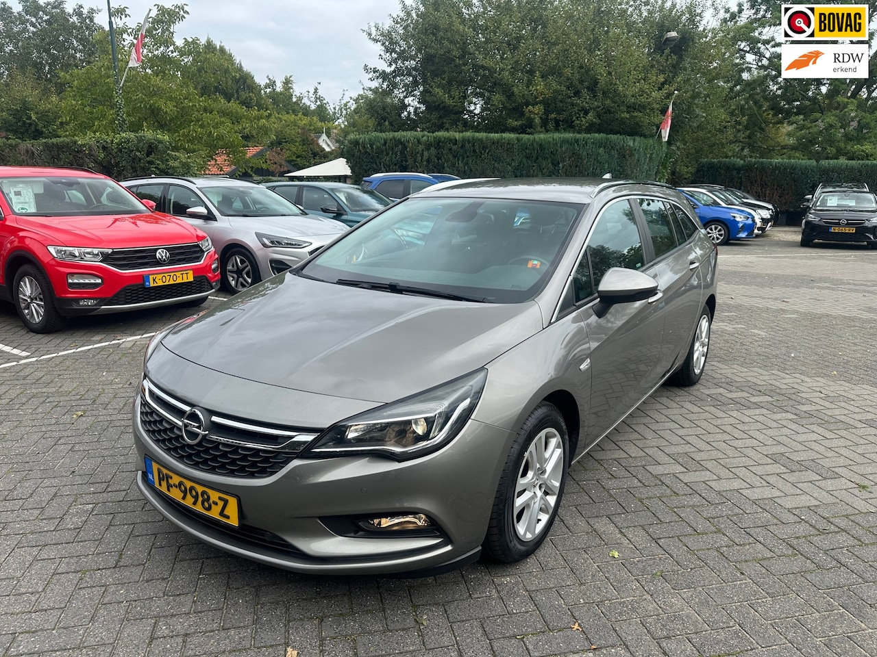 Opel Astra Sports Tourer - 1.0 Online Edition 1.0 Online Edition , navigatie , pdc voor en achter met camera , trekhaak - AutoWereld.nl