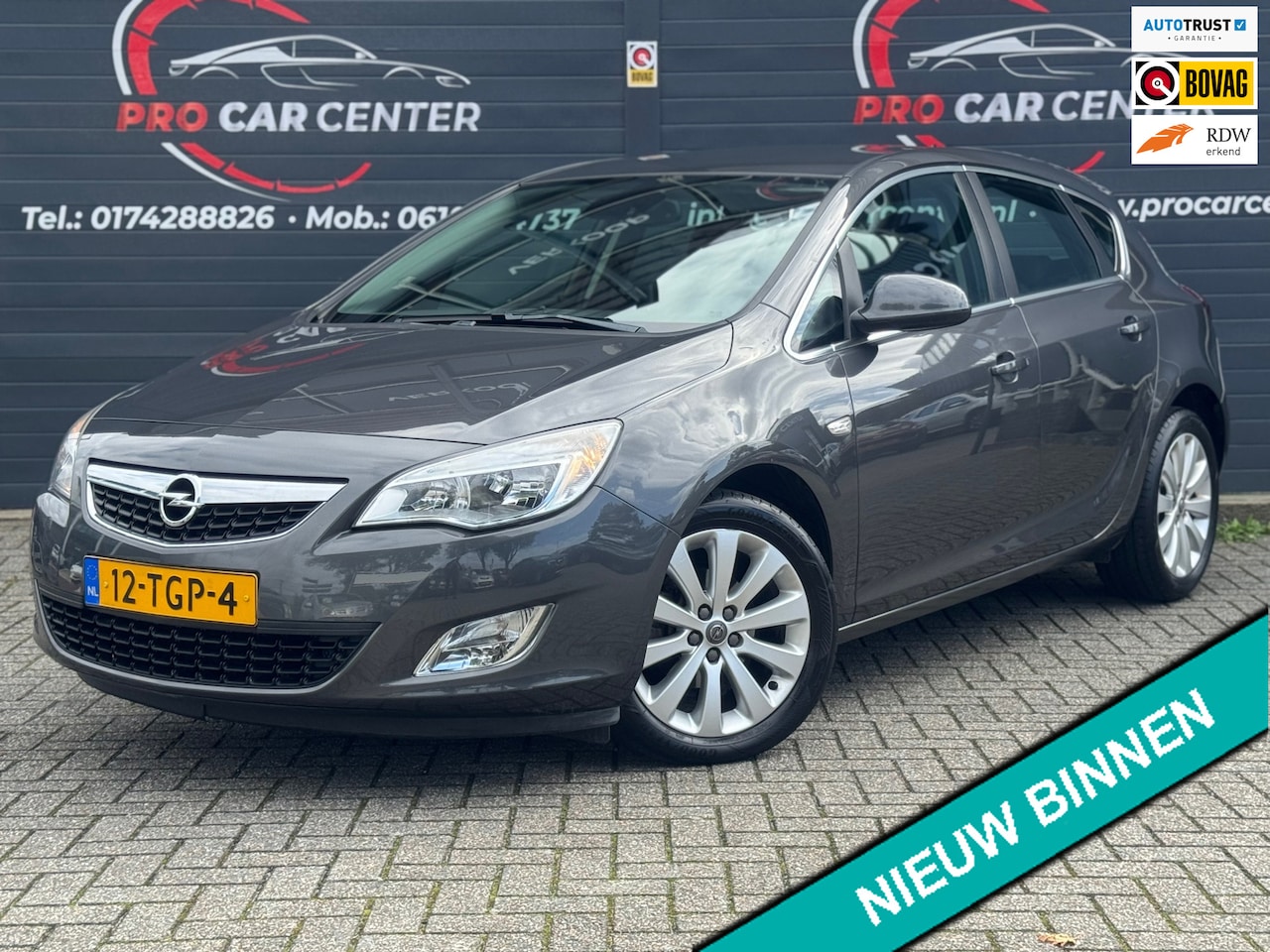 Opel Astra - 1.4 Turbo Cosmo Climate | Cruise | Dealer onderhouden | 1e Eigenaar | Pdc | Navi | El.rame - AutoWereld.nl