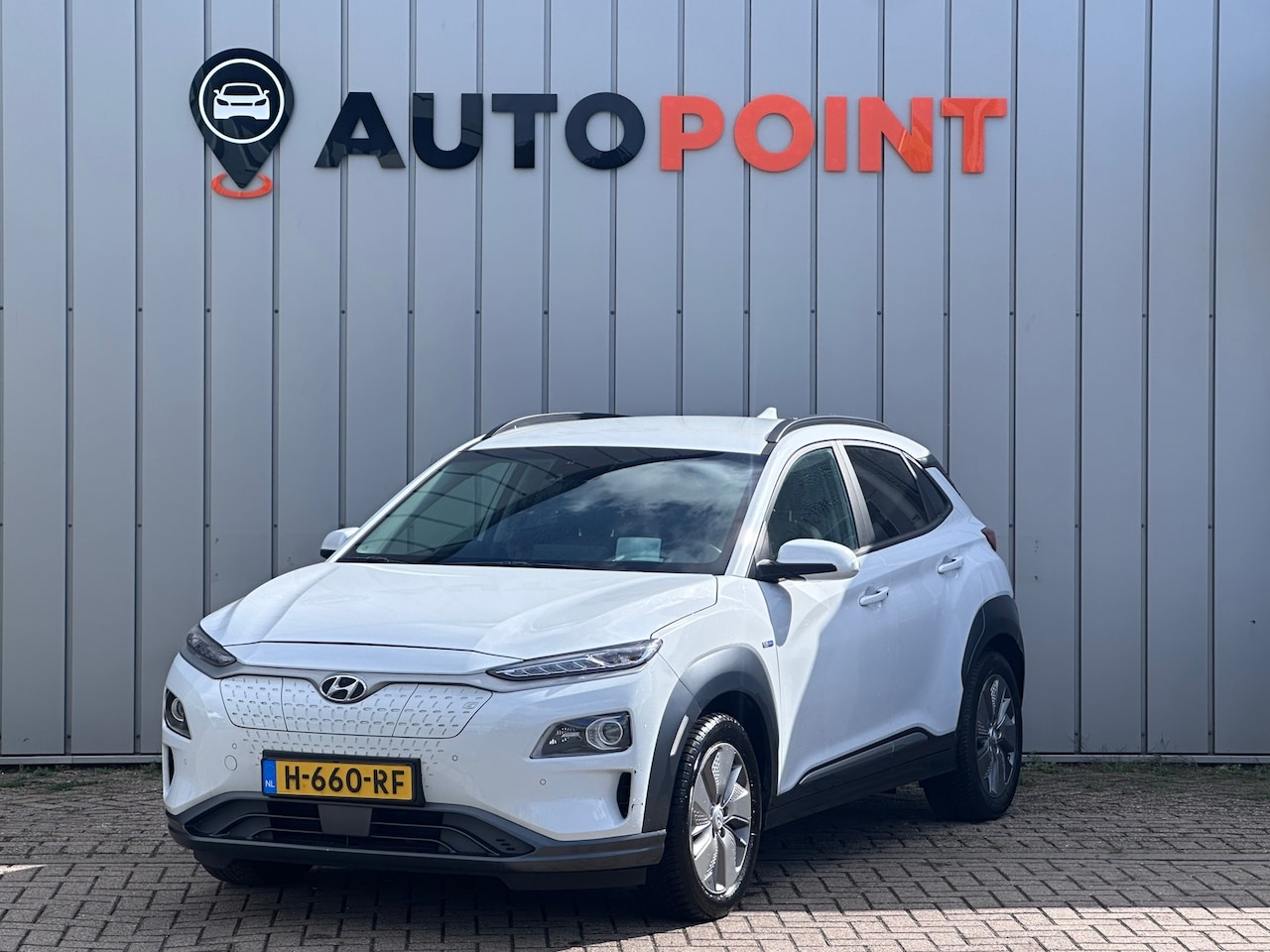 Hyundai Kona Electric - EV Premium 64 kWh WPOMP TREKHAAK SOH 99% 1 EIG DEALER OND HEAD-UP - AutoWereld.nl