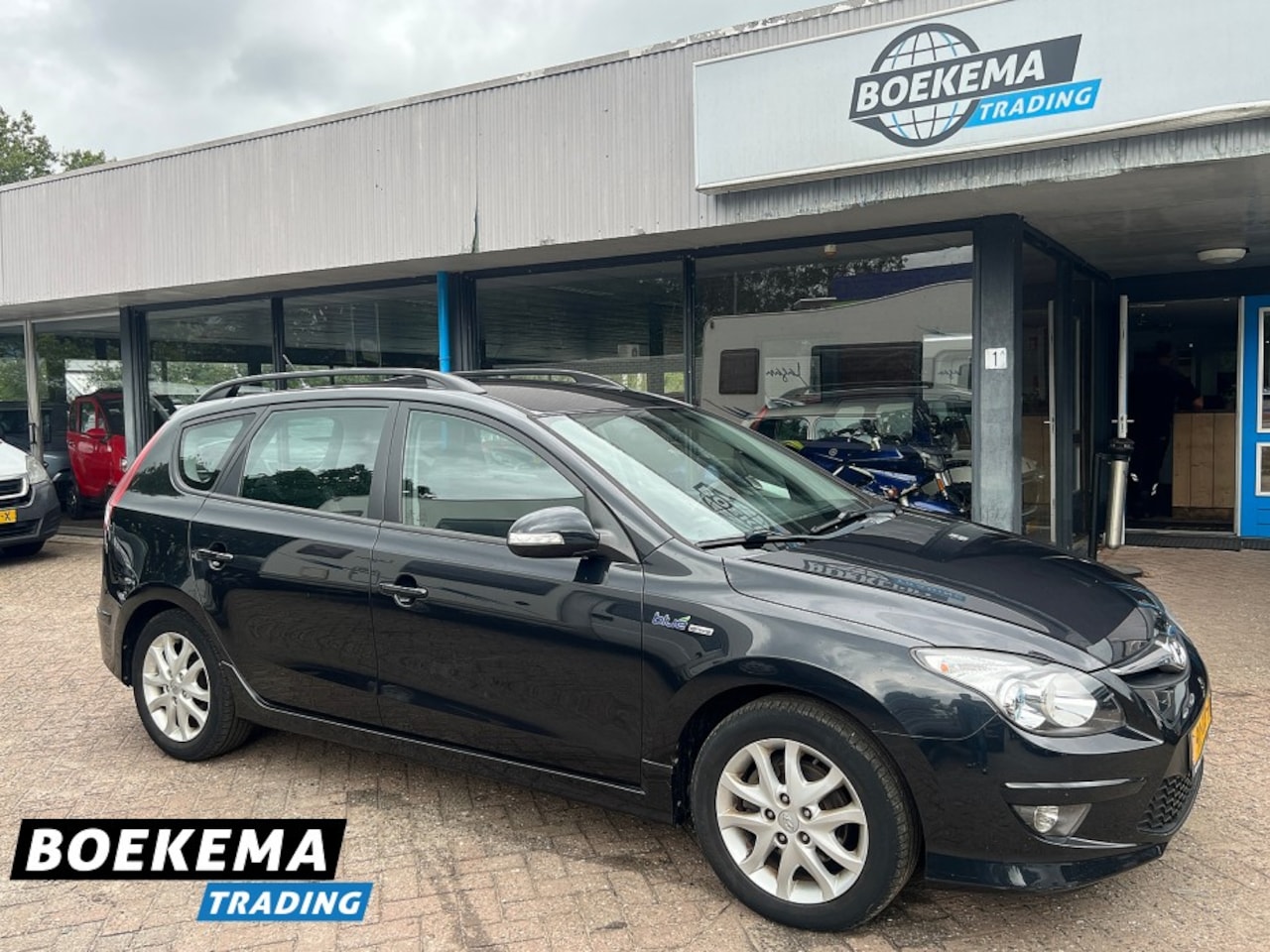Hyundai i30 CW - 1.6i 125PK i-Motion Cruise Clima Trekhaak - AutoWereld.nl