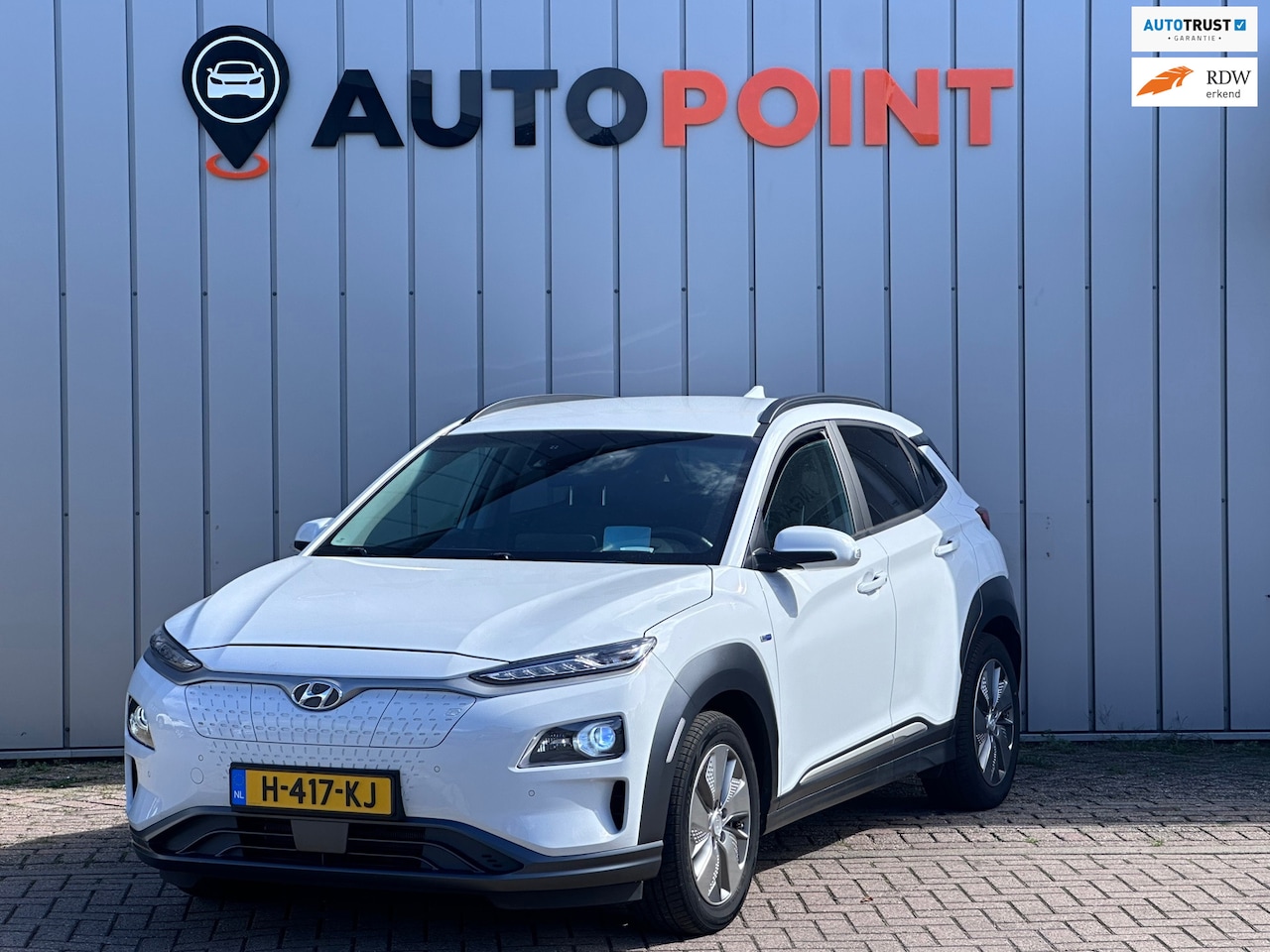 Hyundai Kona Electric - EV Premium 64 kWh SOH 100 % WARMTEPOMP HEAD-UP - AutoWereld.nl