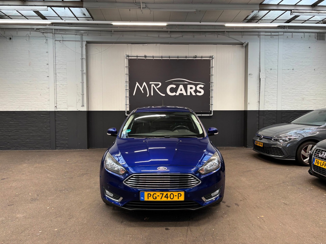 Ford Focus Wagon - 1.0 Titanium Edition Navi/Parkeerhulp/Cruise Control - AutoWereld.nl