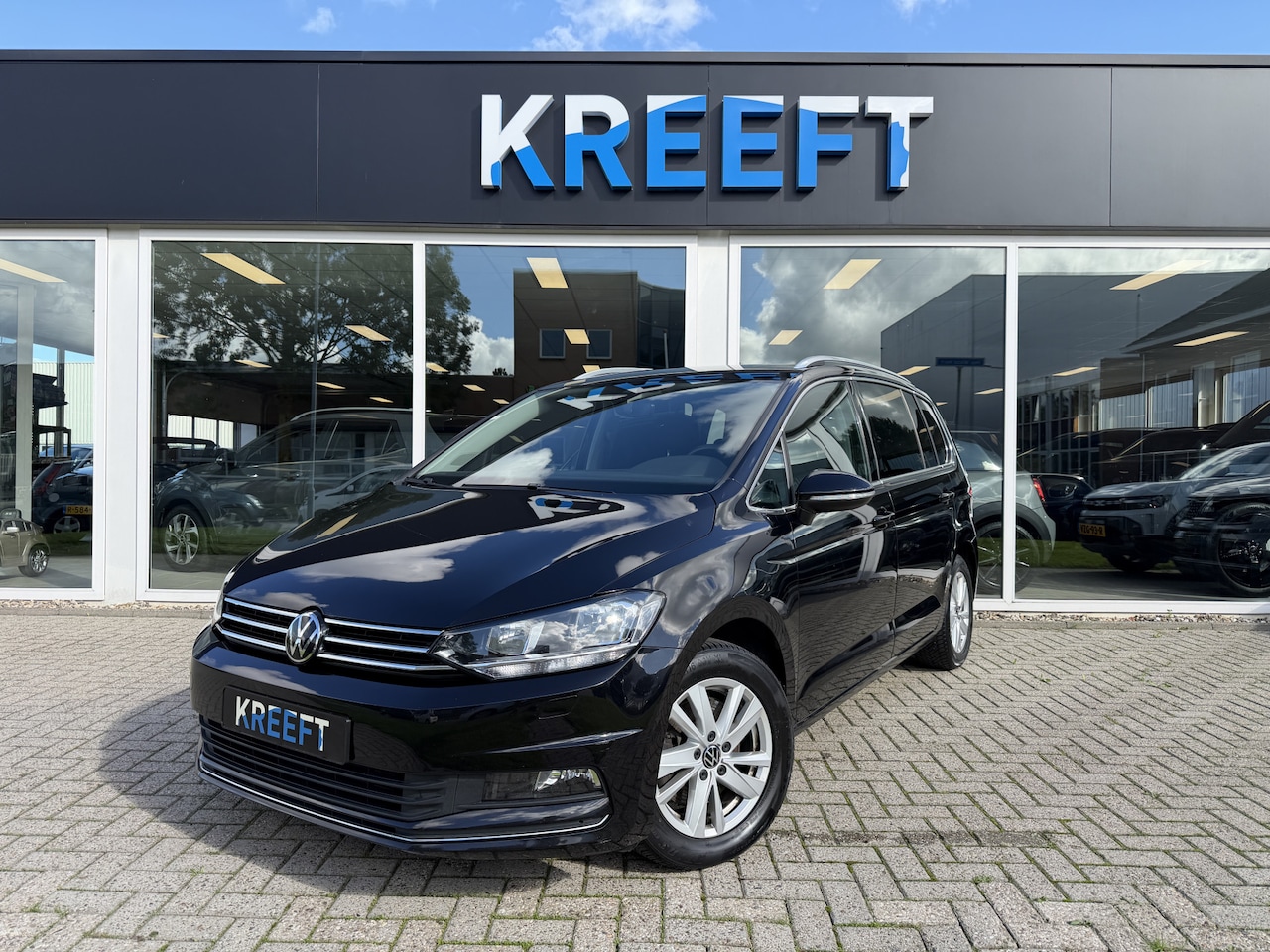 Volkswagen Touran - 1.5 TSI Highline 7p App Carplay - AutoWereld.nl
