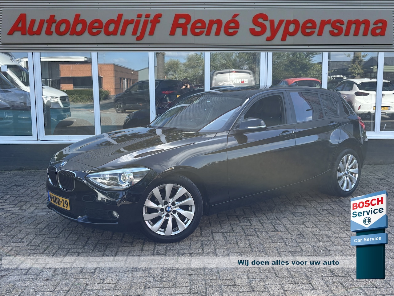 BMW 1-serie - 114i EDE | Stoelverwarming | Leder | Bluetooth | Navi | Cruise - AutoWereld.nl