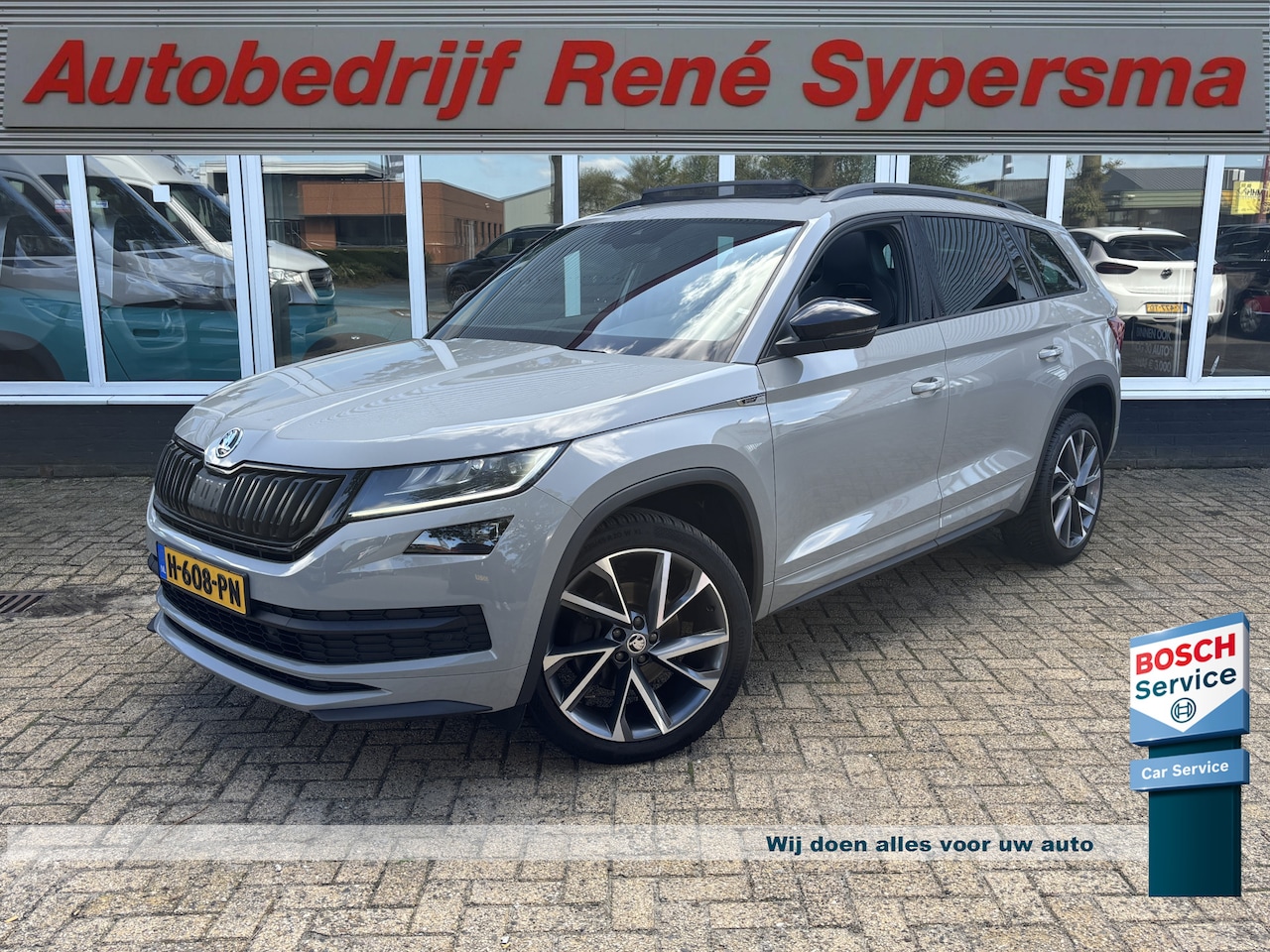 Skoda Kodiaq - 1.5 TSI Sportline Business 7p. | Trekhaak | Pano | Sfeerverlichting | Apple Carplay | Stoe - AutoWereld.nl