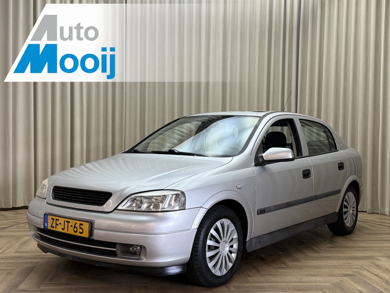 Opel Astra - 1.6-16V Centennial Org.NL! / Automaat / Schuifdak / Sportstoelen / Bluetooth / Elektrische - AutoWereld.nl