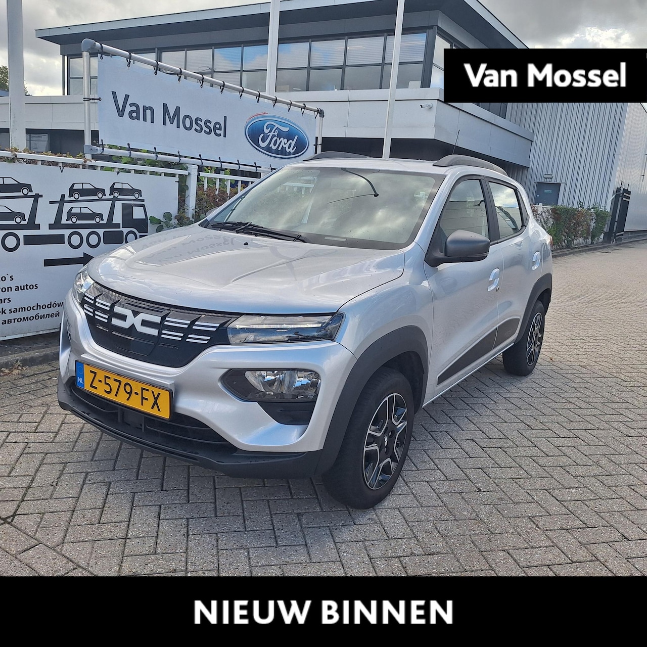 Dacia Spring - Expression 27 kWh | Navigatie | All Weather Banden | Lederen Bekleding | Achteruitrijcamer - AutoWereld.nl