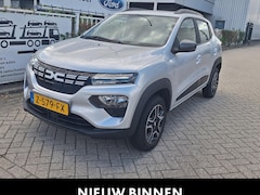 Dacia Spring - Expression 27 kWh | SOH 92% | Navigatie | All Weather Banden | Lederen Bekleding | Achteru