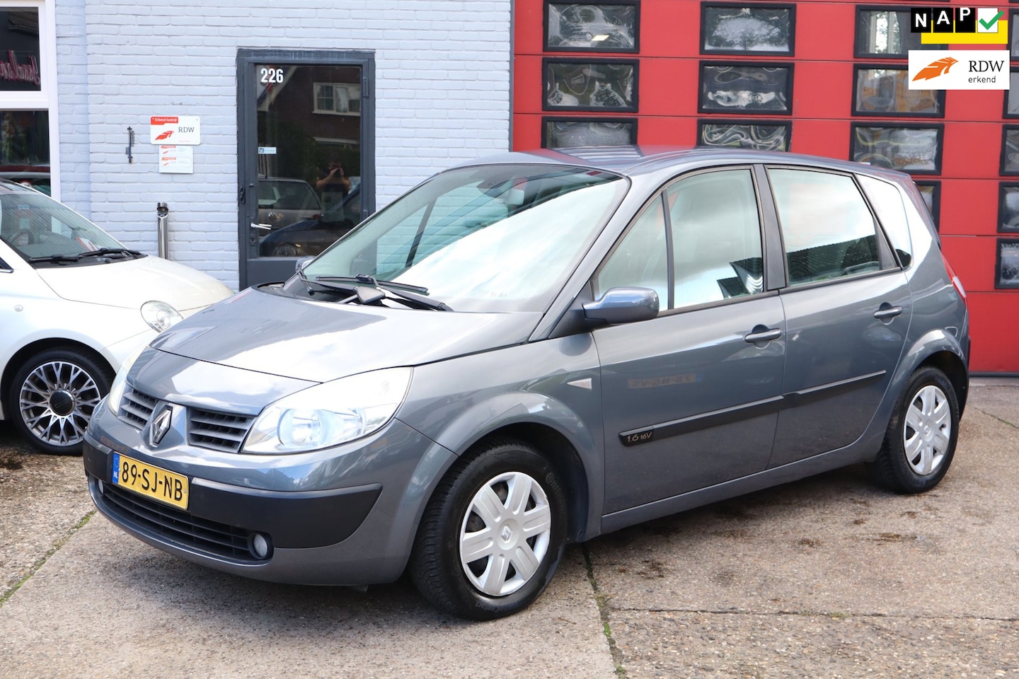 Renault Scénic - 1.6-16V Dynamique Comfort 1.6-16V Dynamique Comfort , AUTOMAAT , AIRCO, CRUISE - AutoWereld.nl