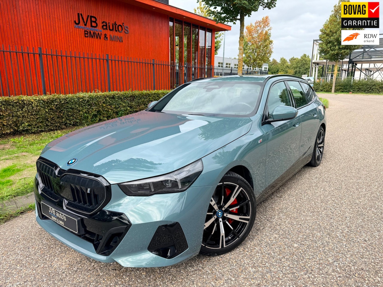 BMW i5 Touring - EDrive40 M-Sport PRO, H&K, trekhaak - AutoWereld.nl