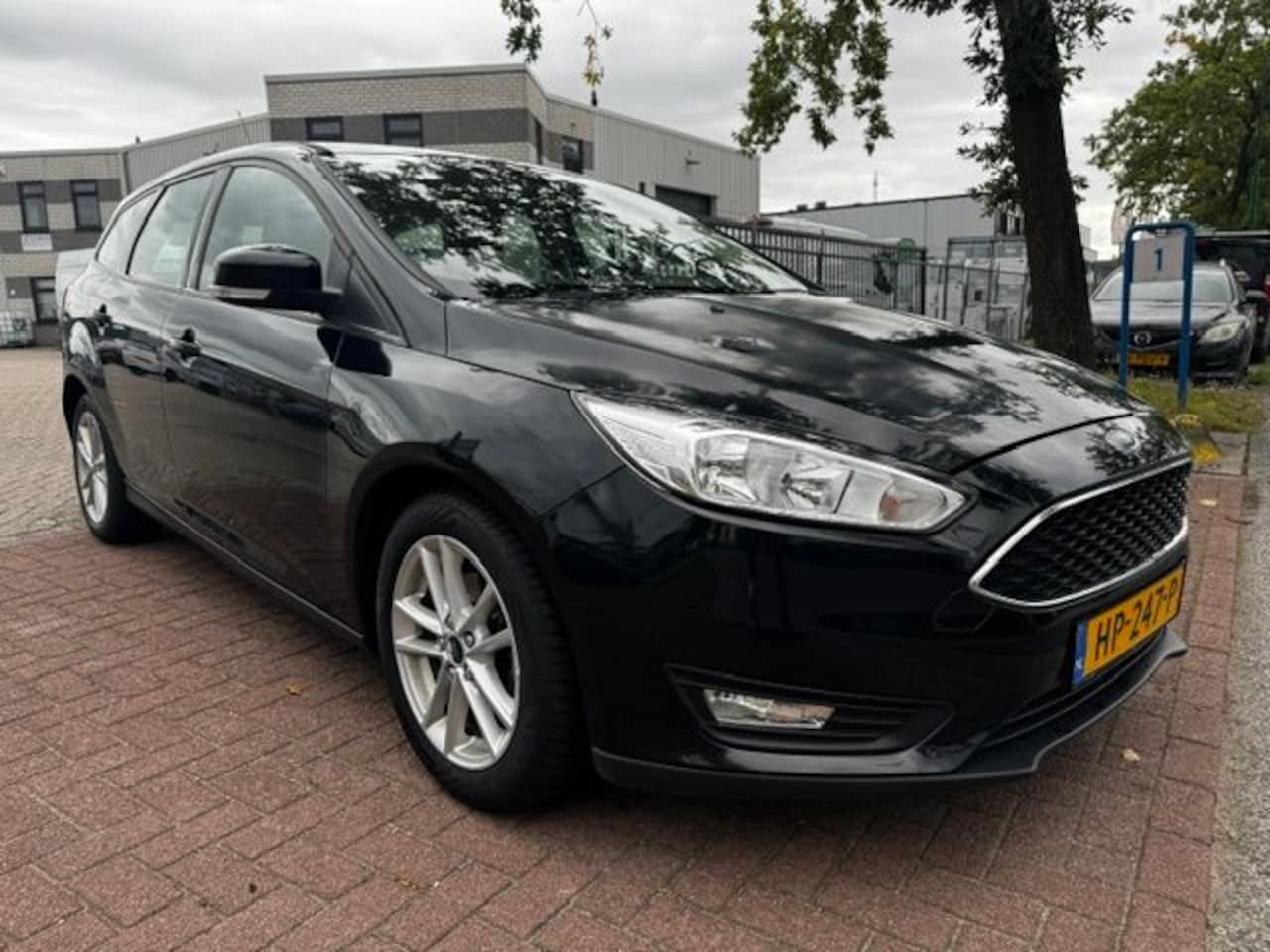 Ford Focus Wagon - 1.0 125pk Titanium Edition Airco/ECC,Cruisecontrol,Navigatie - AutoWereld.nl