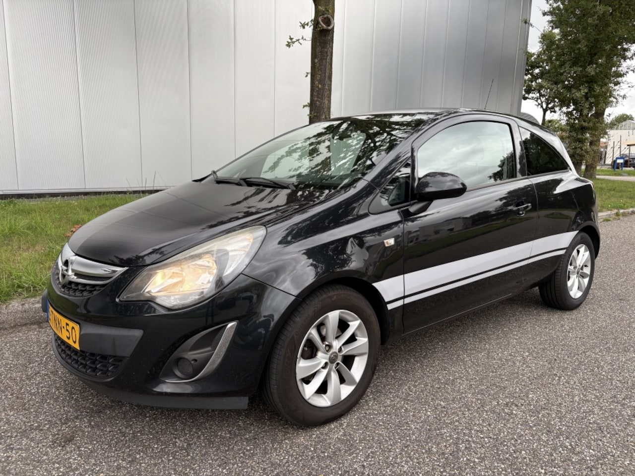 Opel Corsa - 1.2 LPG-G3 Half leer Cruise Navi Storing LPG - AutoWereld.nl