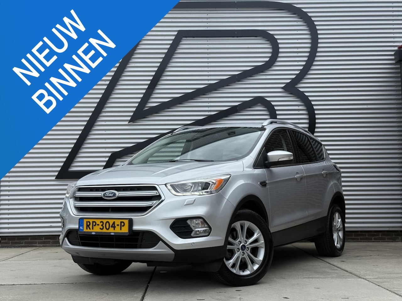 Ford Kuga - 1.5 EcoBoost Titanium 2e Eigenaar|Navi|Trekhaak|Camera|Stoelverwarming|Clima|Cruise|N.A.P| - AutoWereld.nl