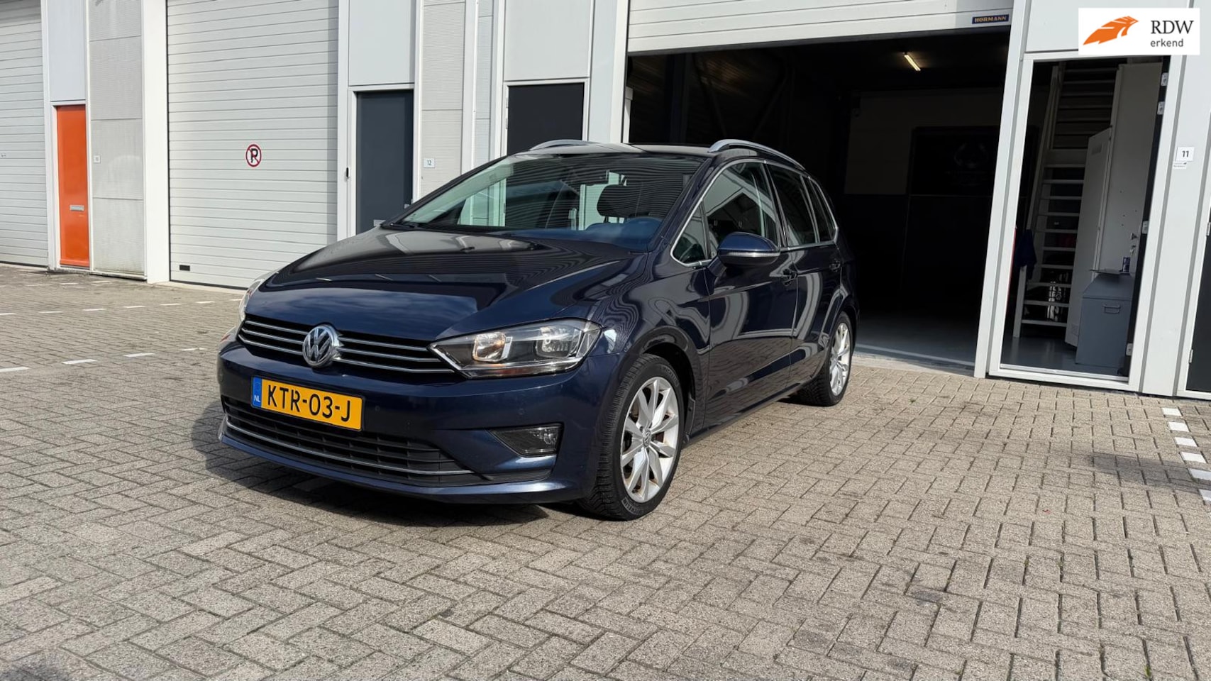 Volkswagen Golf Sportsvan - 2.0 TDI Highline DSG 2015 - AutoWereld.nl