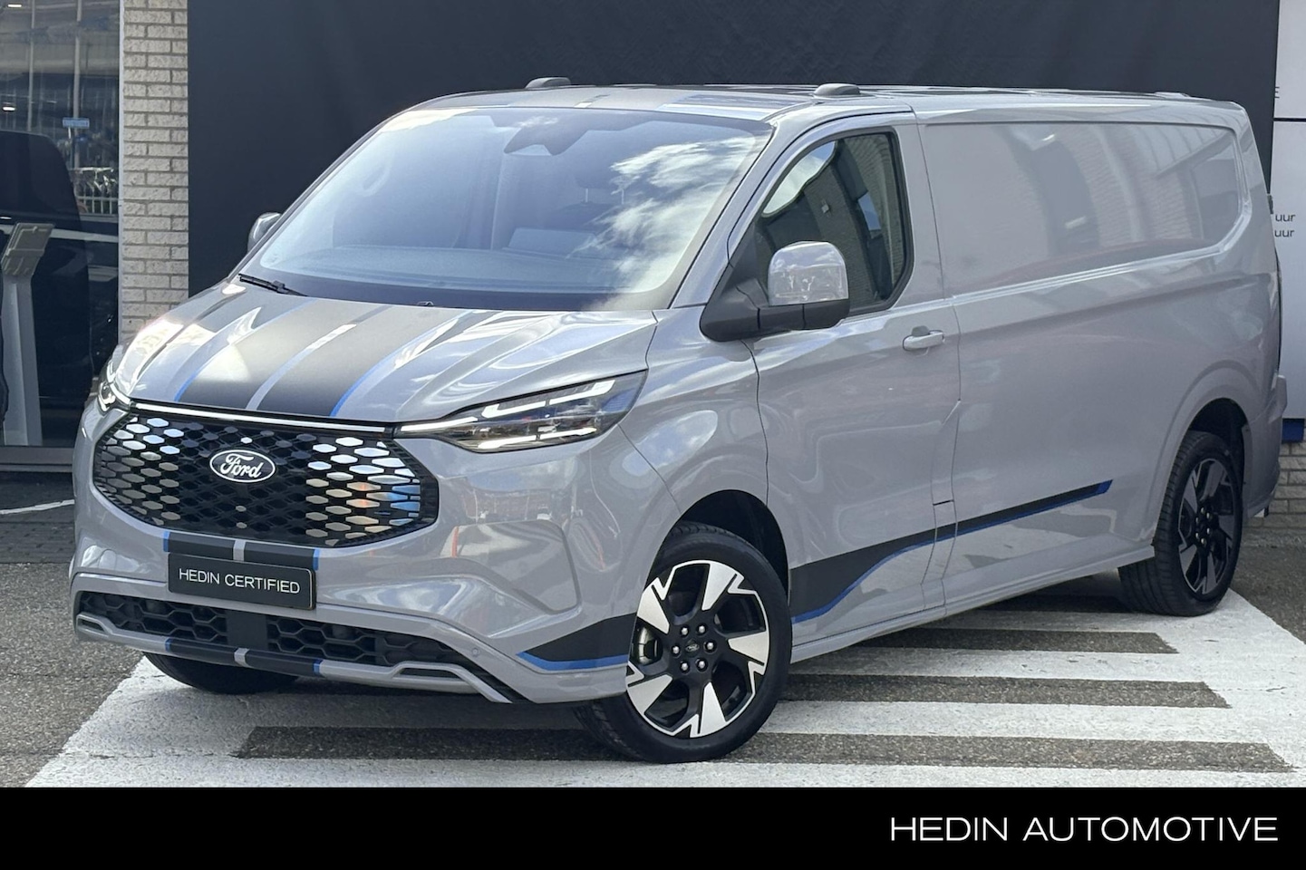 Ford E-Transit Cust. - 320 L2H1 Sport 65 kWh | 218 PK | Driver ass pack | 19 inch | Trekhaak elekt | - AutoWereld.nl