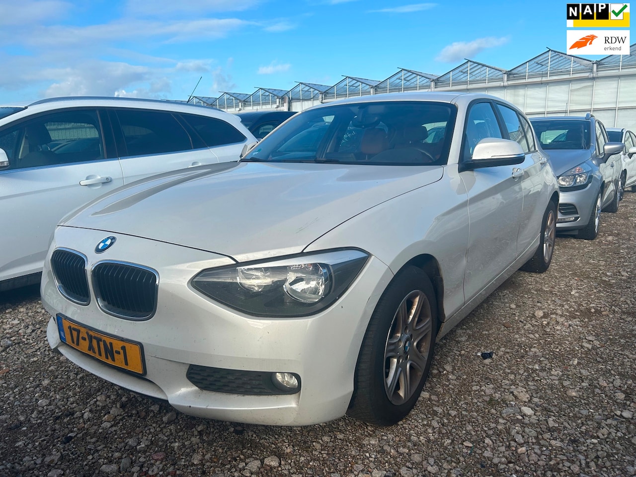 BMW 1-serie - 116i Business | 2012 | Benzine | Handgeschakeld | SCHADE AUTO | - AutoWereld.nl