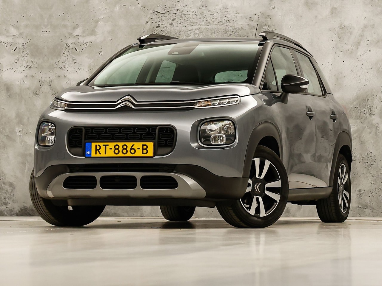 Citroën C3 Aircross - 1.2 PureTech Sport (APPLE CARPLAY, GROOT NAVI, LOGISCH NAP, LM VELGEN, PARKEERSENSOREN, SP - AutoWereld.nl