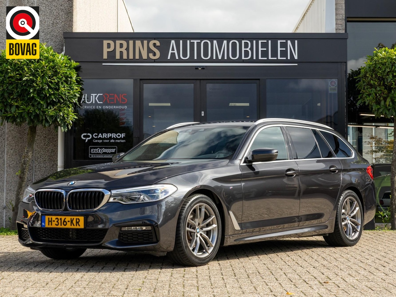 BMW 5-serie Touring - 520i M-Sport, NLauto, Headup, Trekhaak, Keyless - AutoWereld.nl