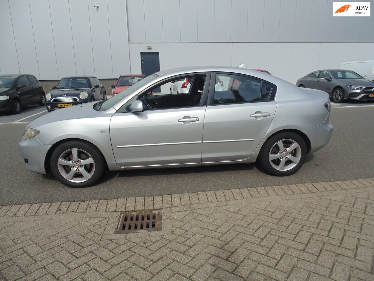 Mazda 3 Sport - 1.6 Touring Sportline MET AIRCO NAVI - AutoWereld.nl