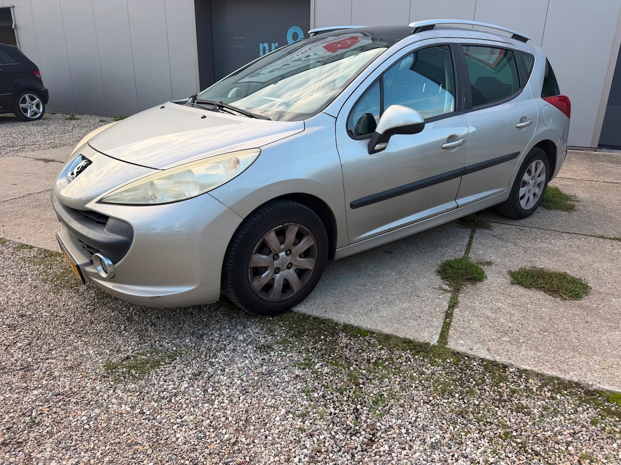 Peugeot 207 SW - 1.4 VTi XS Pack met airco en panodak - AutoWereld.nl