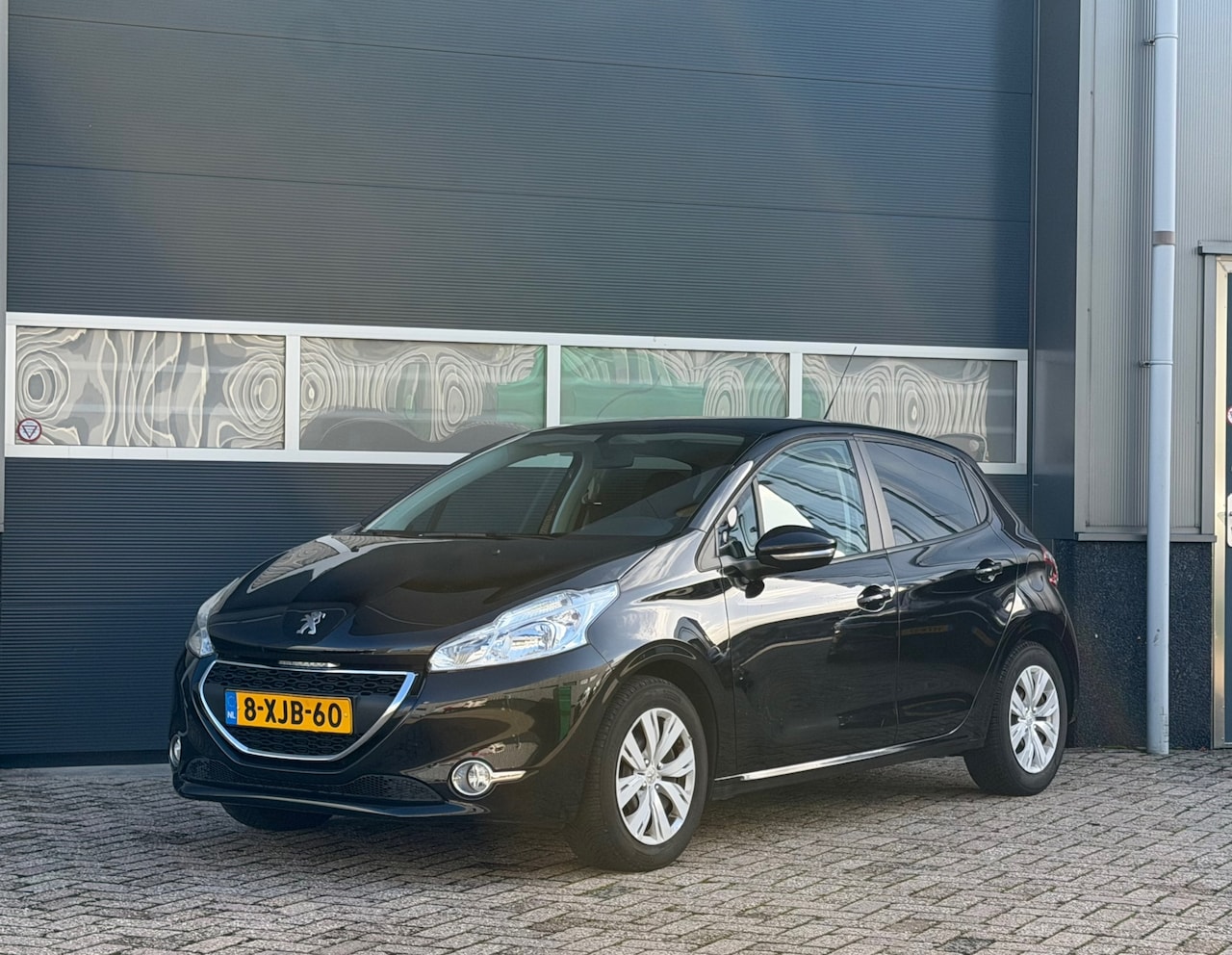 Peugeot 208 - 1.2 VTi Urban Soul bj.2013 Navi|Airco|Cc. - AutoWereld.nl