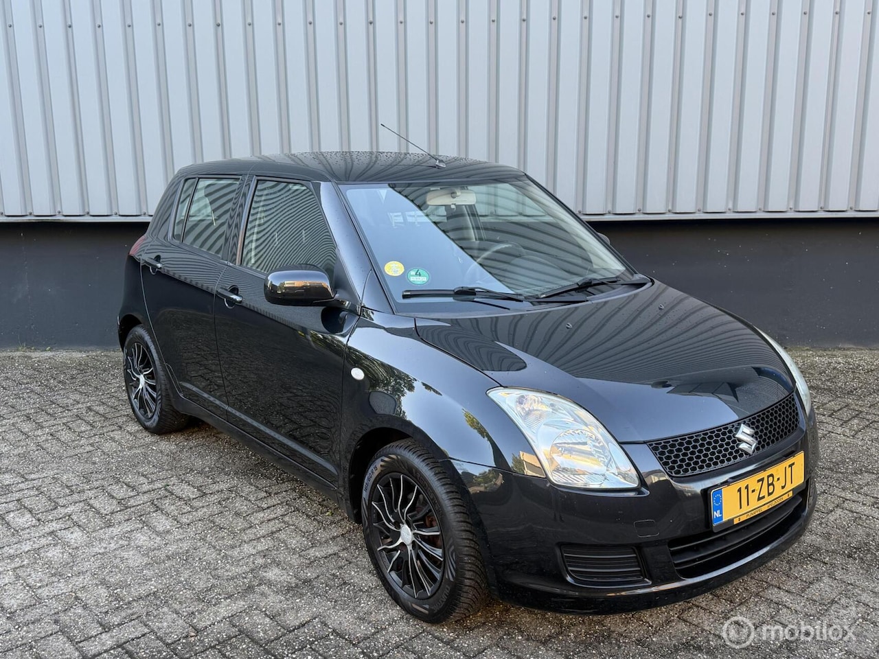Suzuki Swift - 1.3 Exclusive 1.3 Exclusive - AutoWereld.nl