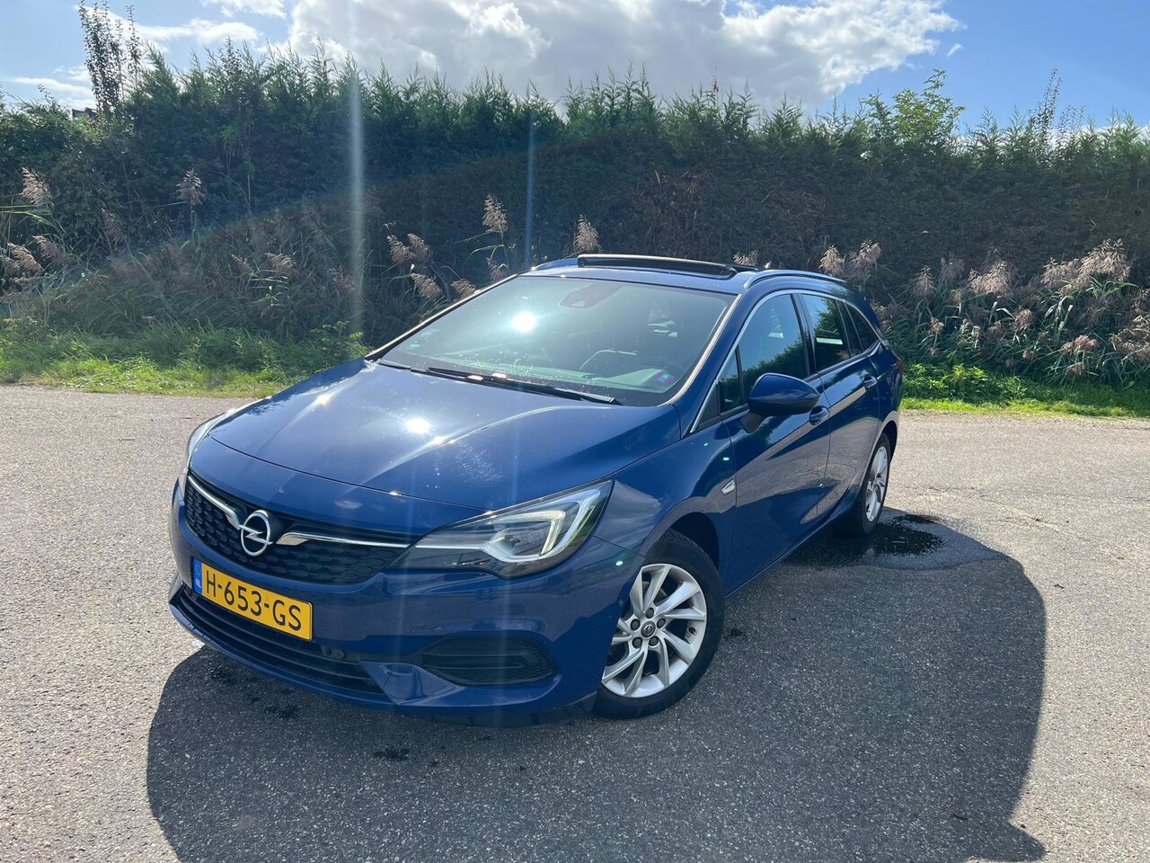 Opel Astra Sports Tourer - 1.2 SCHUIFDAK SPORTSTOELEN OPENDAK CARPLAY ECC LED - AutoWereld.nl