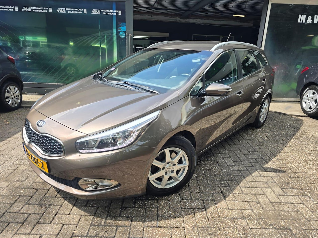 Kia Cee'd Sportswagon - 1.6 GDI Plus Pack | 2E EIGENAAR | 3/6 OF 12 MND GARANTIE | NAVI | CAMERA | TREKHAAK | - AutoWereld.nl