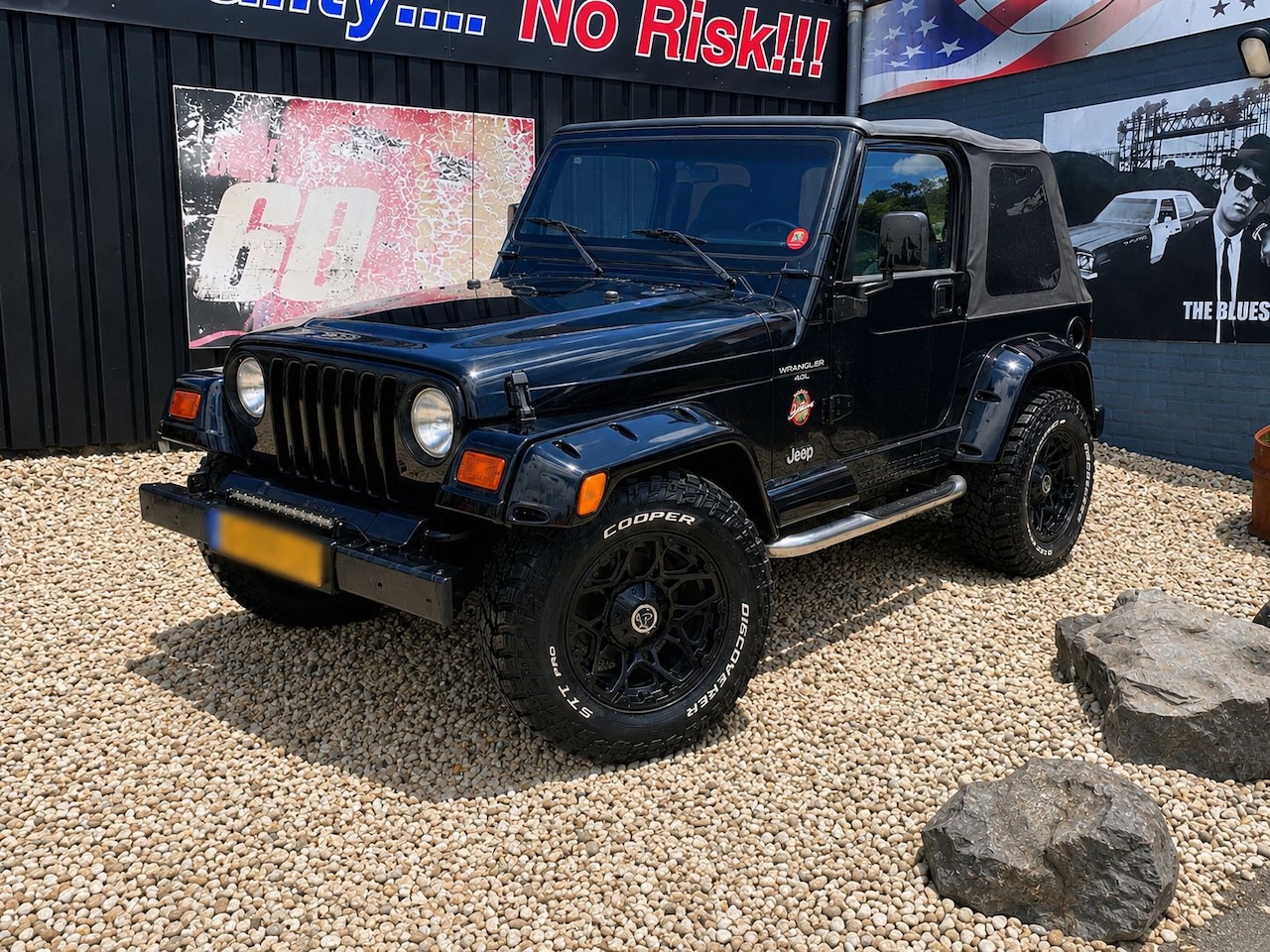 Jeep Wrangler - 4.0i-BLACK SAHARA EDITION-GERESTAUREERD - AutoWereld.nl