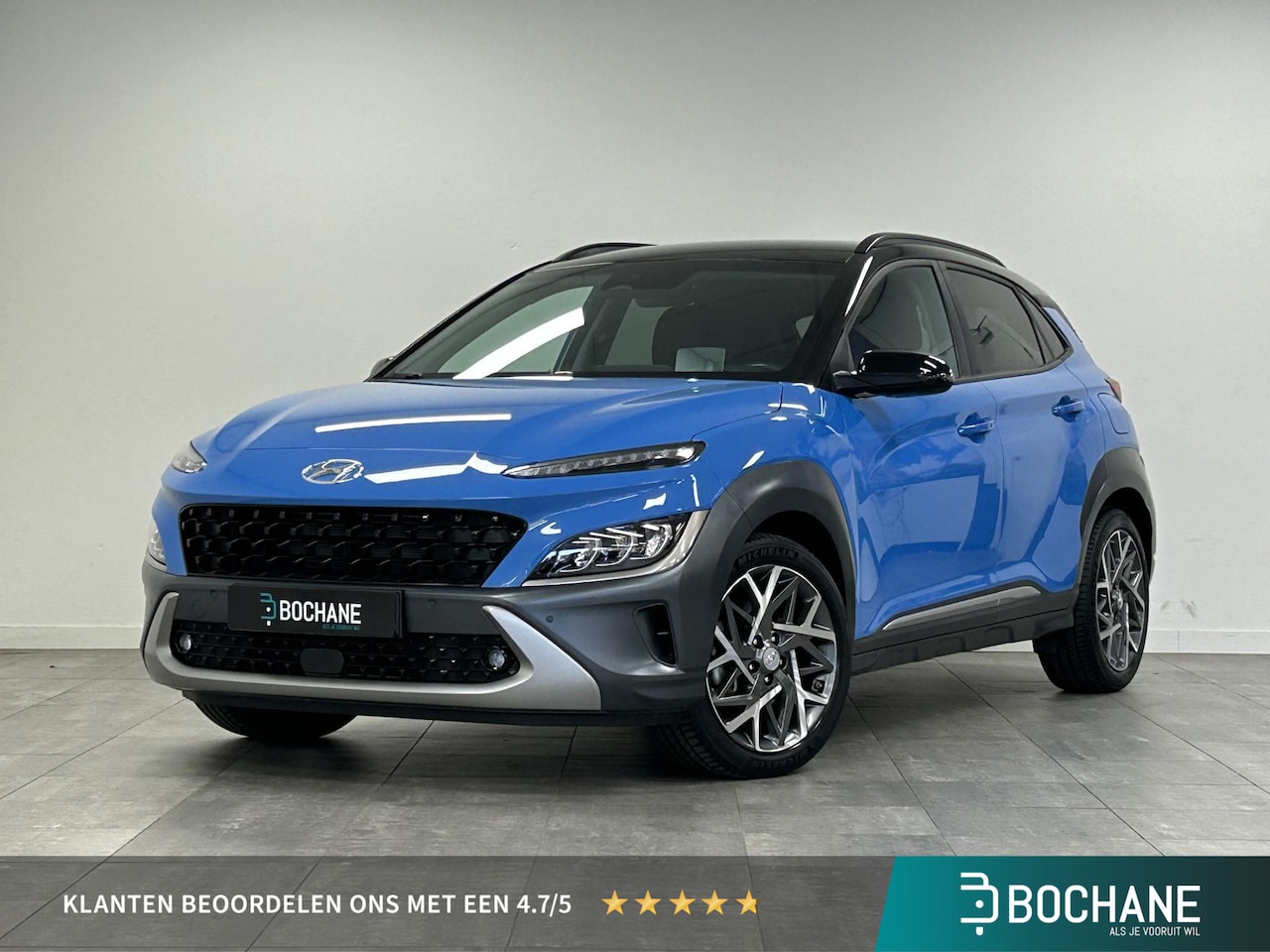 Hyundai Kona - 1.6 GDI HEV Premium | HUD | NAVI | CAMERA | LED | STOELVERWARMING | STOELVENTILATIE | TREK - AutoWereld.nl