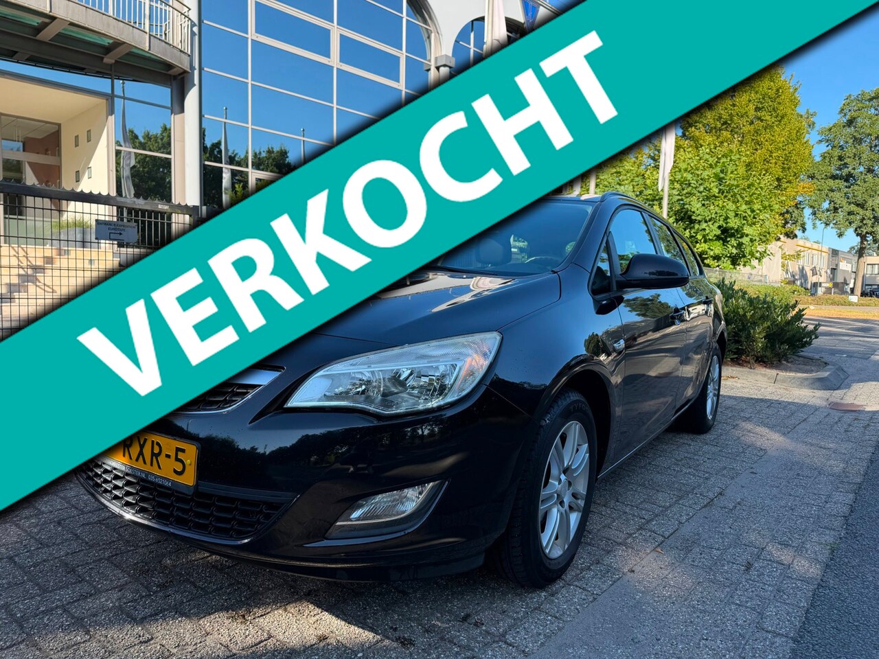 Opel Astra Sports Tourer - 1.4 Edition airco,navi,apk - AutoWereld.nl