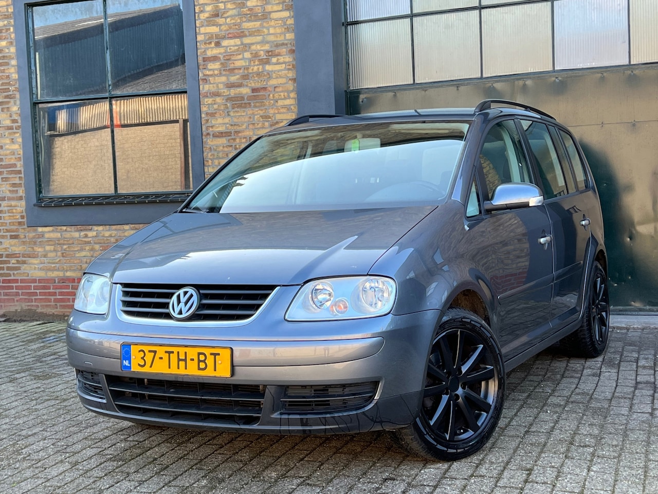 Volkswagen Touran - 1.6 Optive II | Airco + Cruise | - AutoWereld.nl