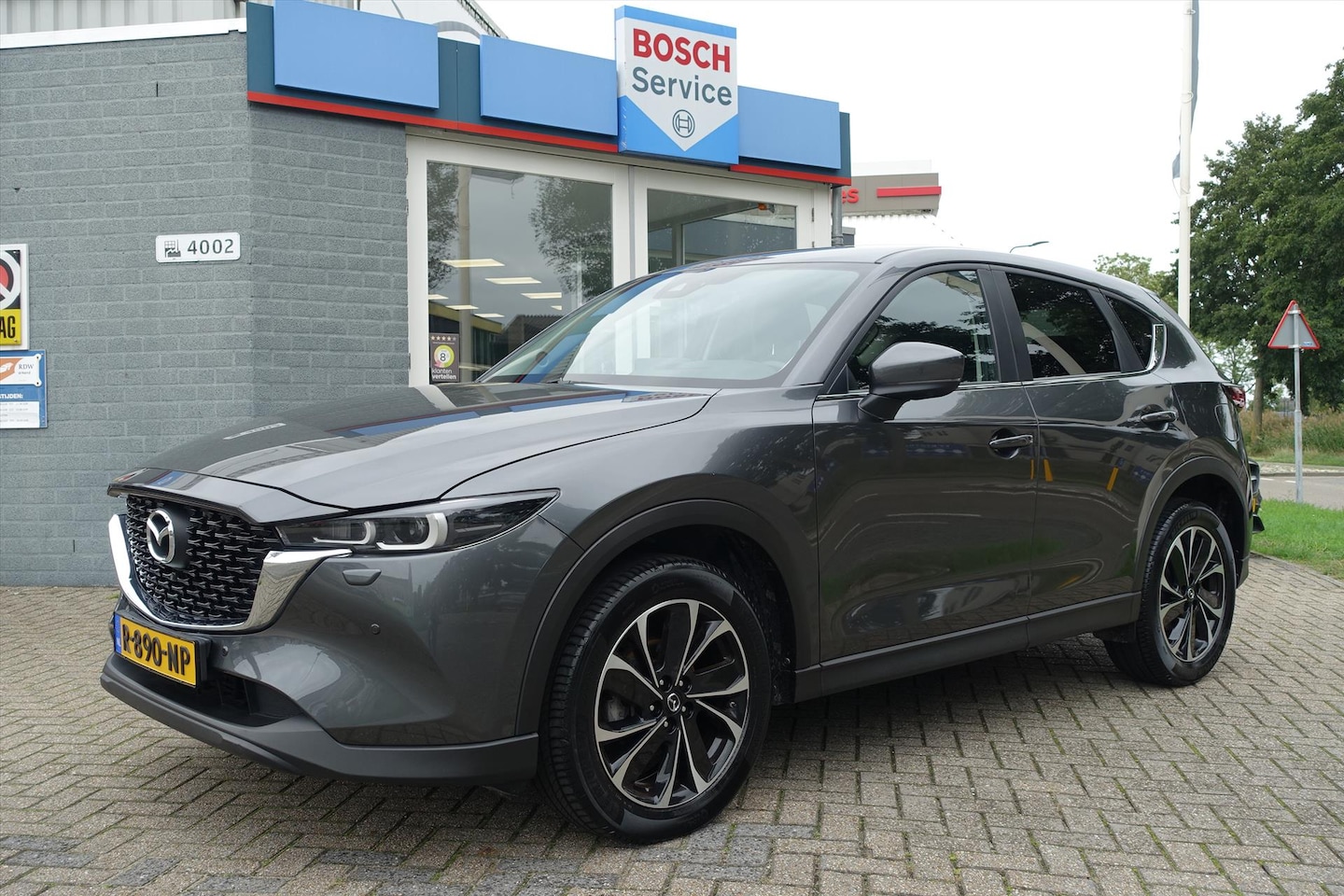 Mazda CX-5 - 2.0 SKYACTIV-G 165pk Comfort | ORIG NL | TREKHAAK | HUD | LED | KEYLESS - AutoWereld.nl