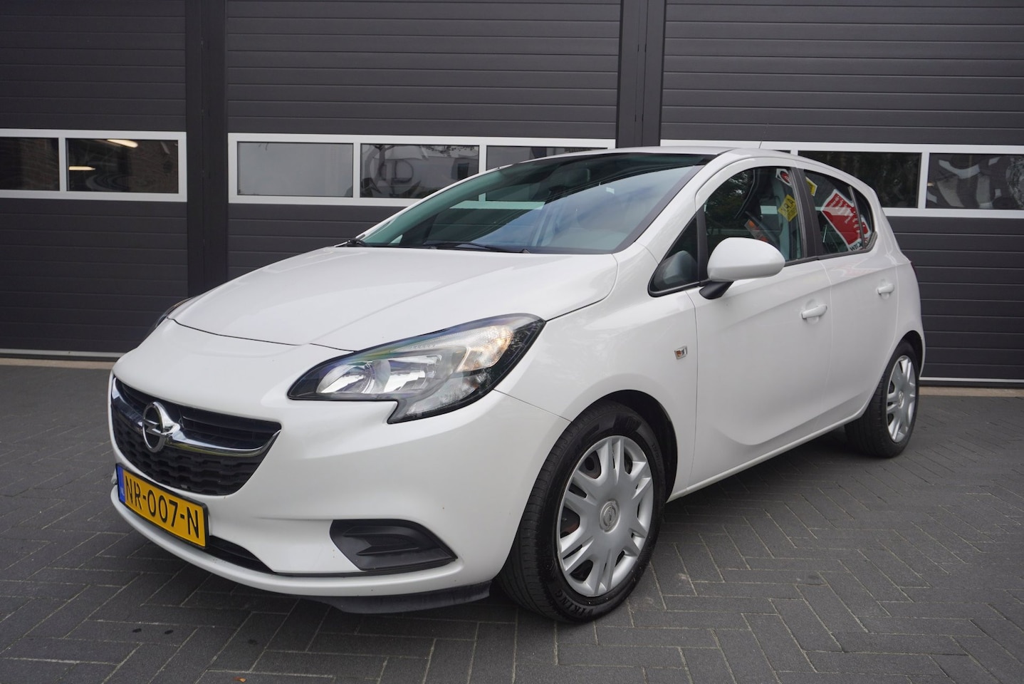 Opel Corsa - 1.4 Edition Airco/Cruise/Trekhaak - AutoWereld.nl