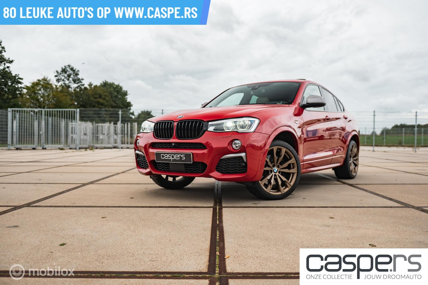 BMW X4 - M40i | Melbourne Red | Surround View | Adap. LED - AutoWereld.nl