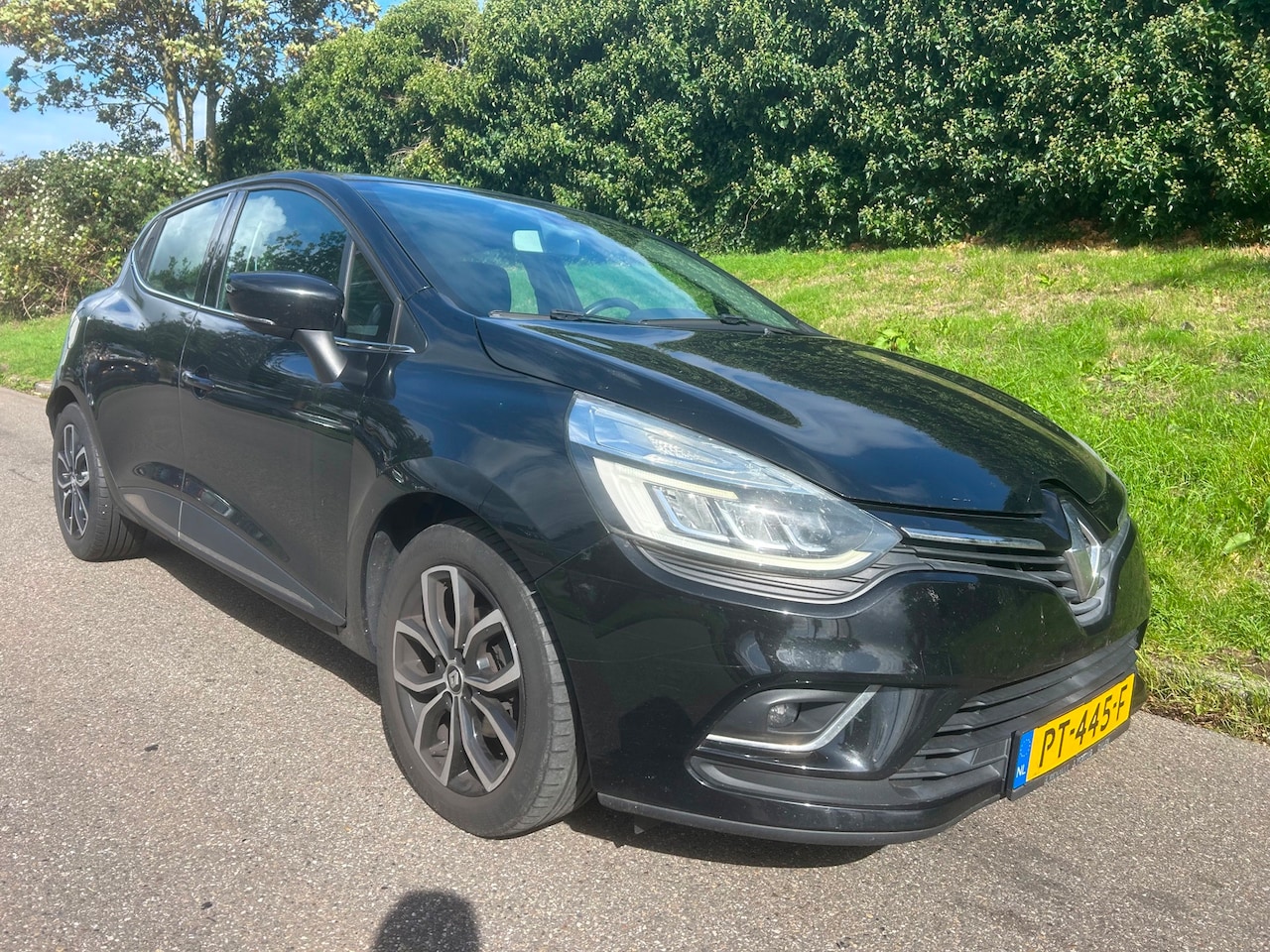 Renault Clio - 1.5 dCi Ecoleader Intens - Navi - Clima - PDC - AutoWereld.nl