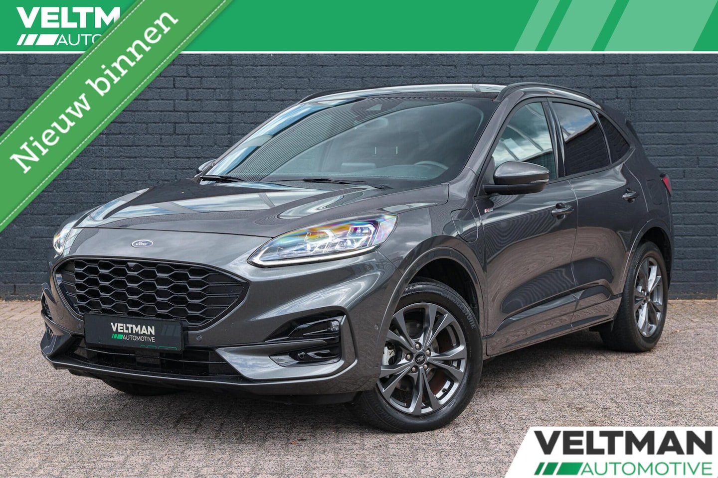 Ford Kuga - 2.5 PHEV ST-Line X PANO TREKHAAK ADAPTIVE CRUISE CAMERA STUURVERWARMING B&O - AutoWereld.nl