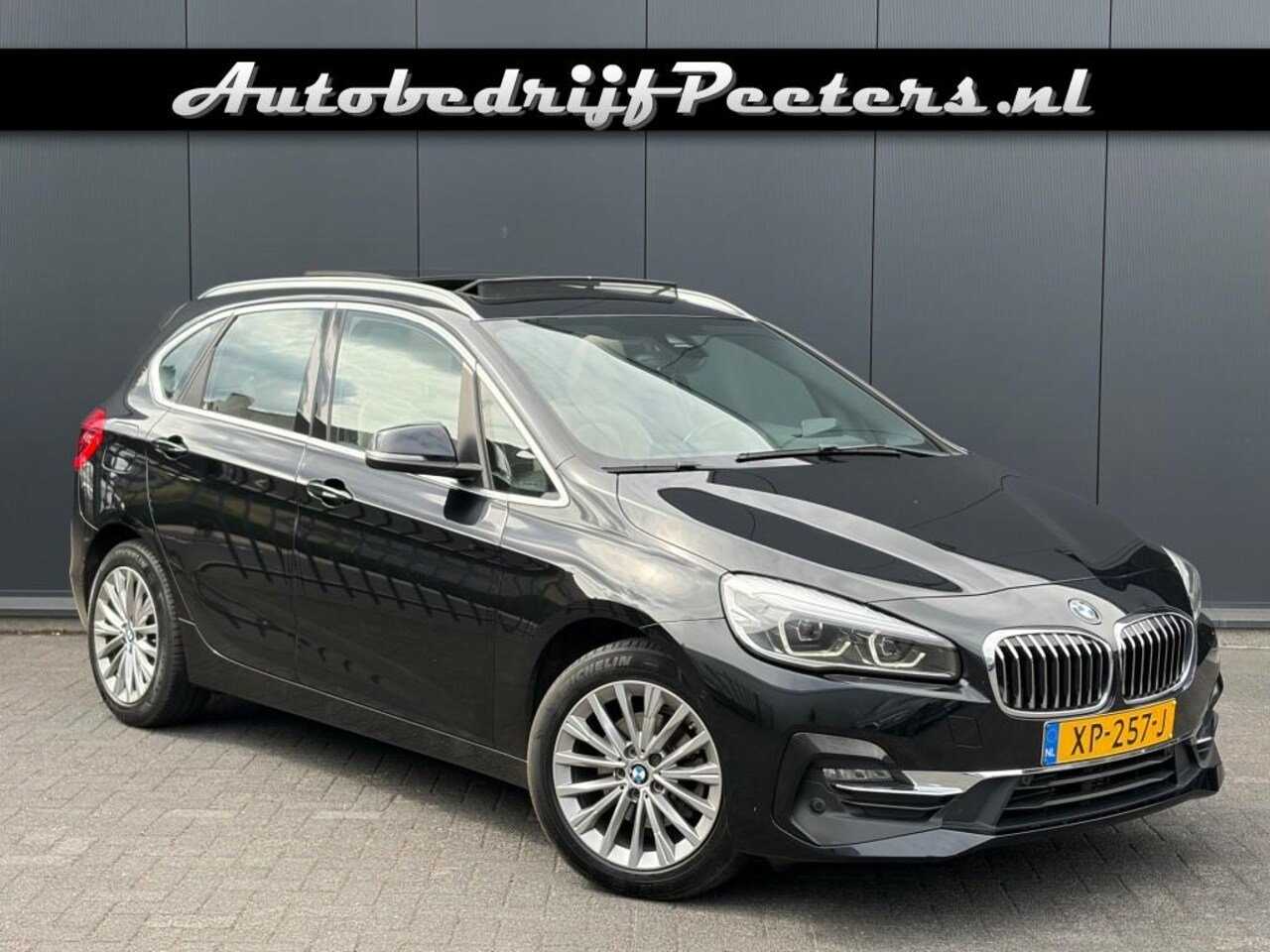 BMW 2-serie Active Tourer - 218i Aut. Pano LED Leder Camera Navi Cruise HUD Trekhaak NL-auto - AutoWereld.nl